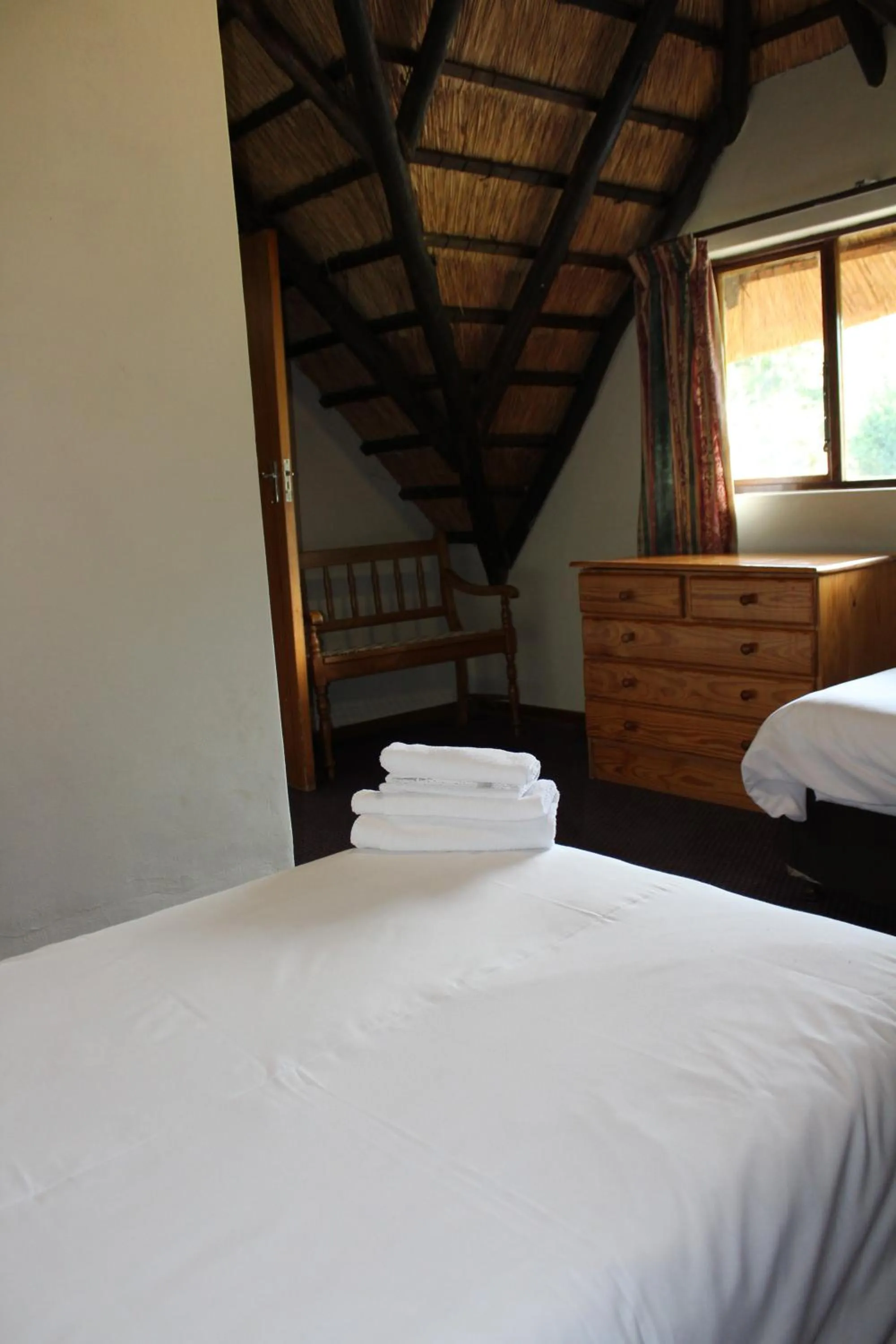 Bedroom, Bed in Dragon Peaks Mountain Resort