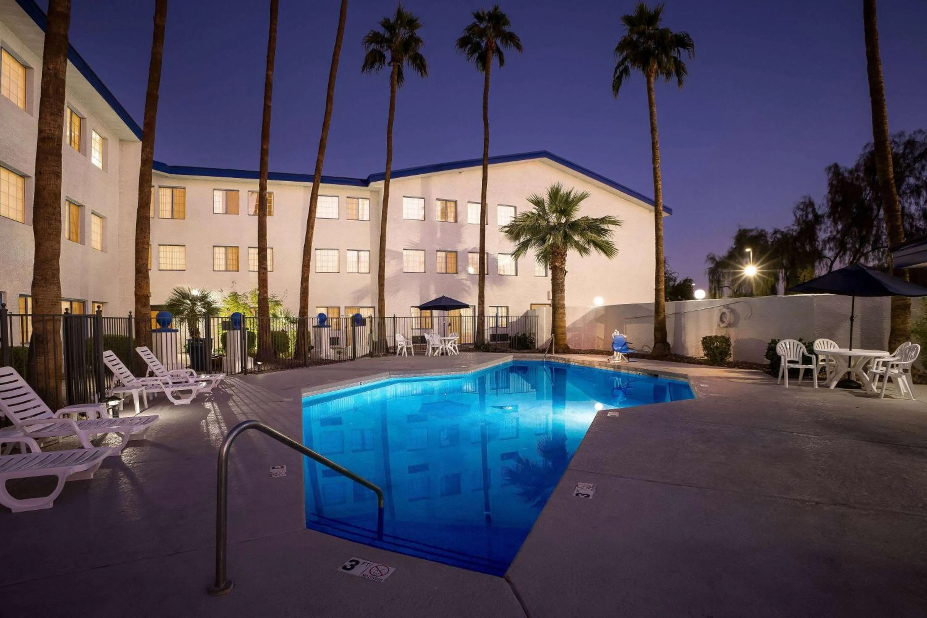 Swimming pool in Days Inn & Suites by Wyndham Mesa Near Phoenix