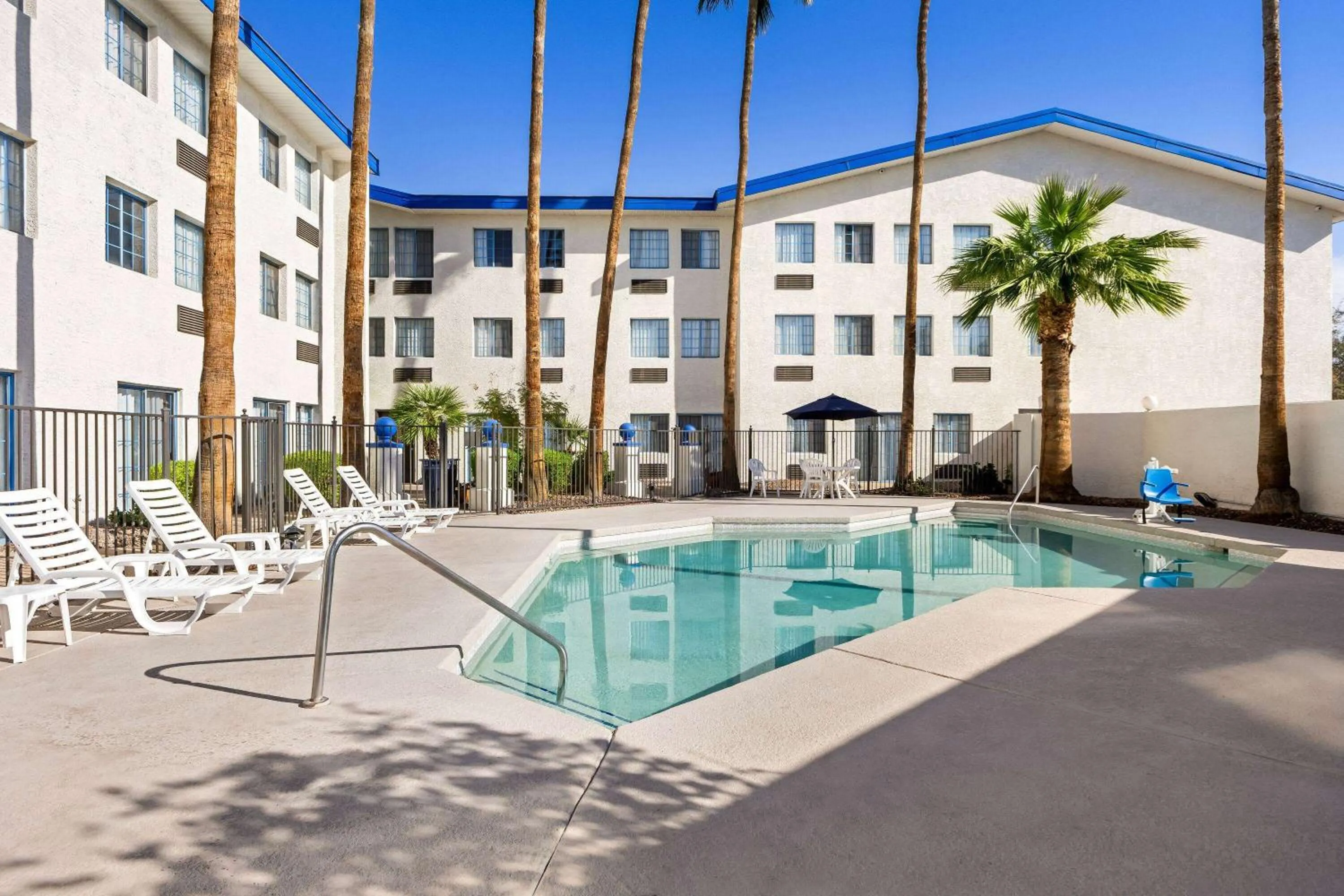 Swimming pool in Days Inn & Suites by Wyndham Mesa Near Phoenix