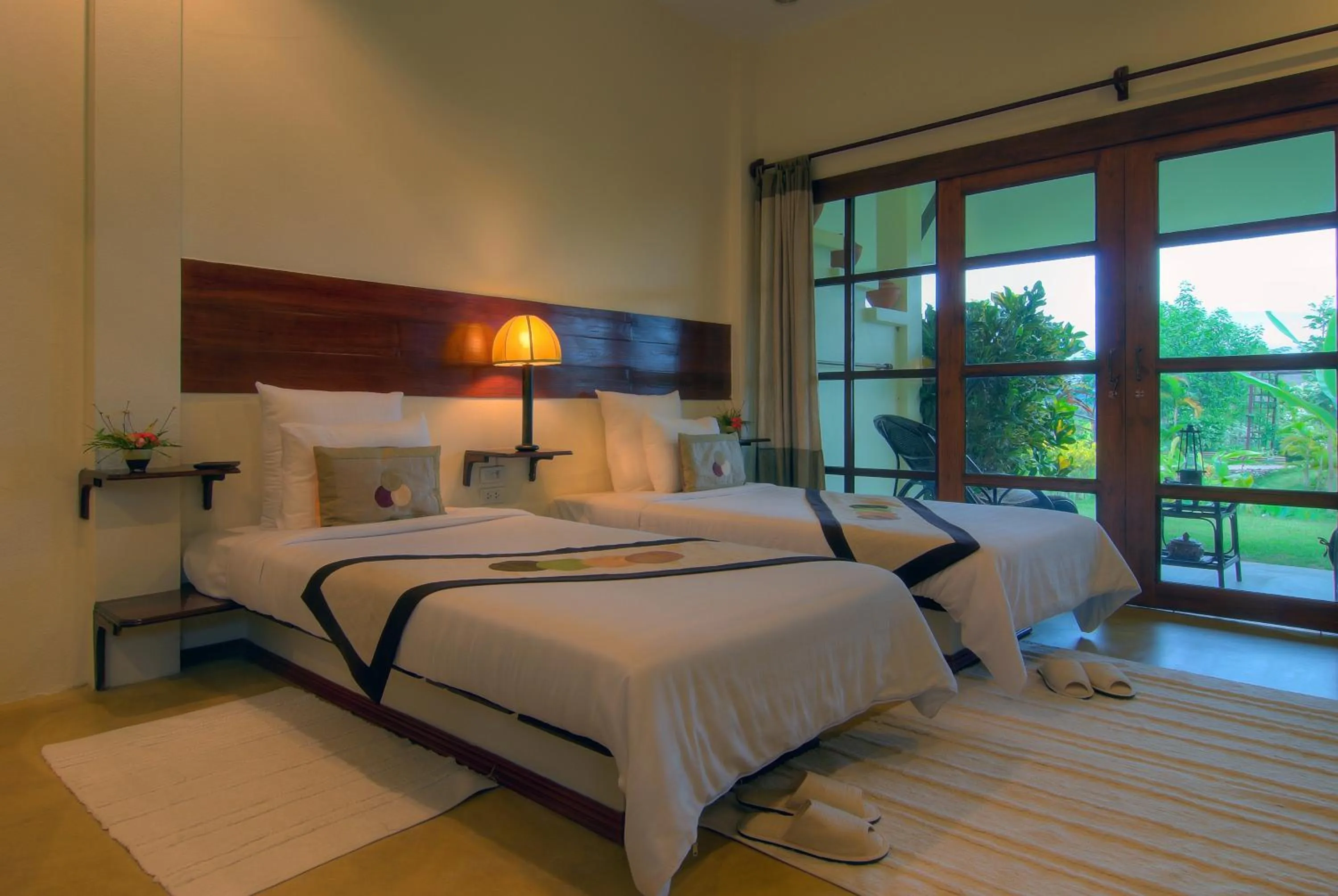 Bed in Maekok River Village Resort
