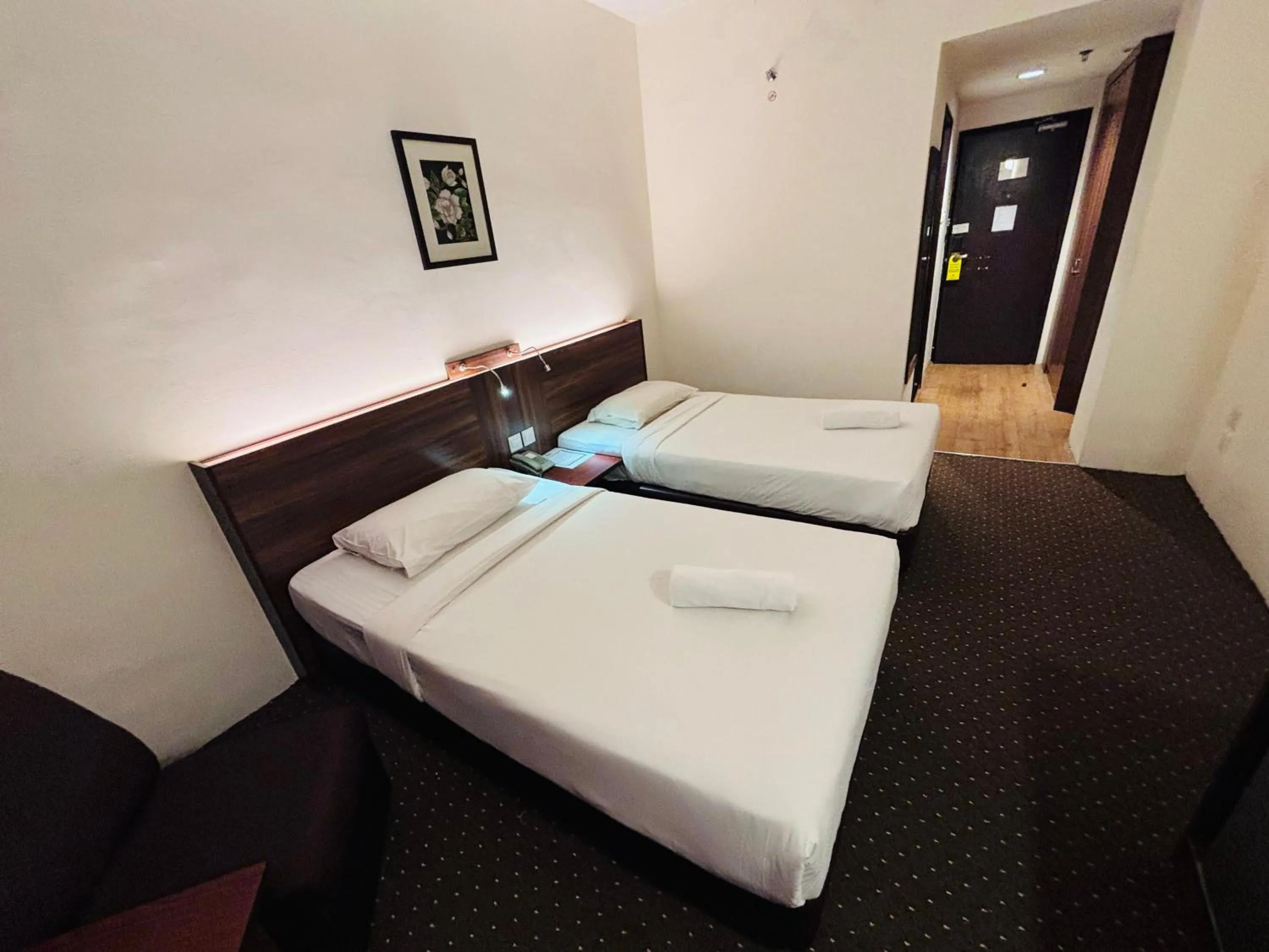 Bed in Hotel Yt Midtown Kuala Terengganu