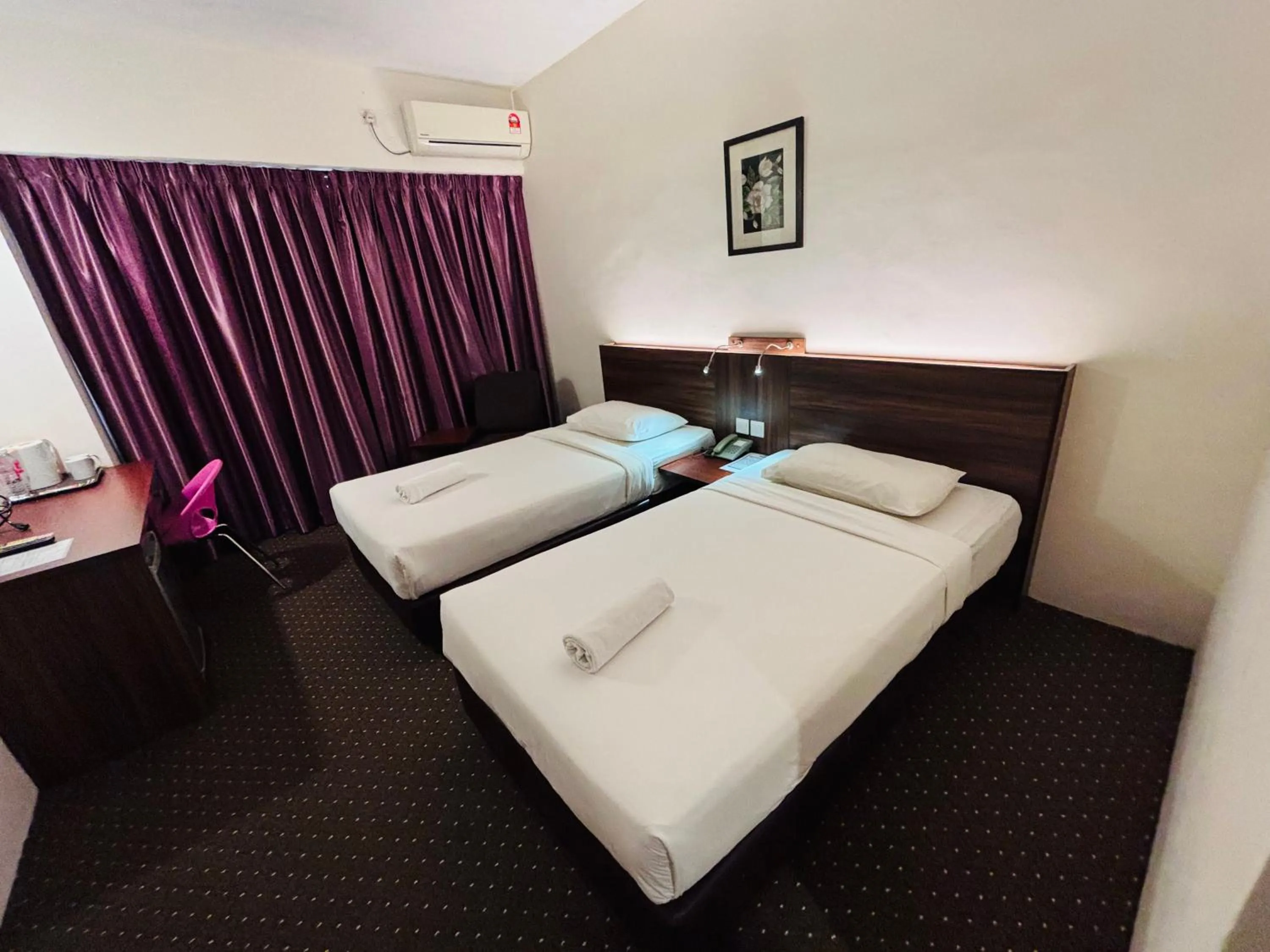 Bed in Hotel Yt Midtown Kuala Terengganu