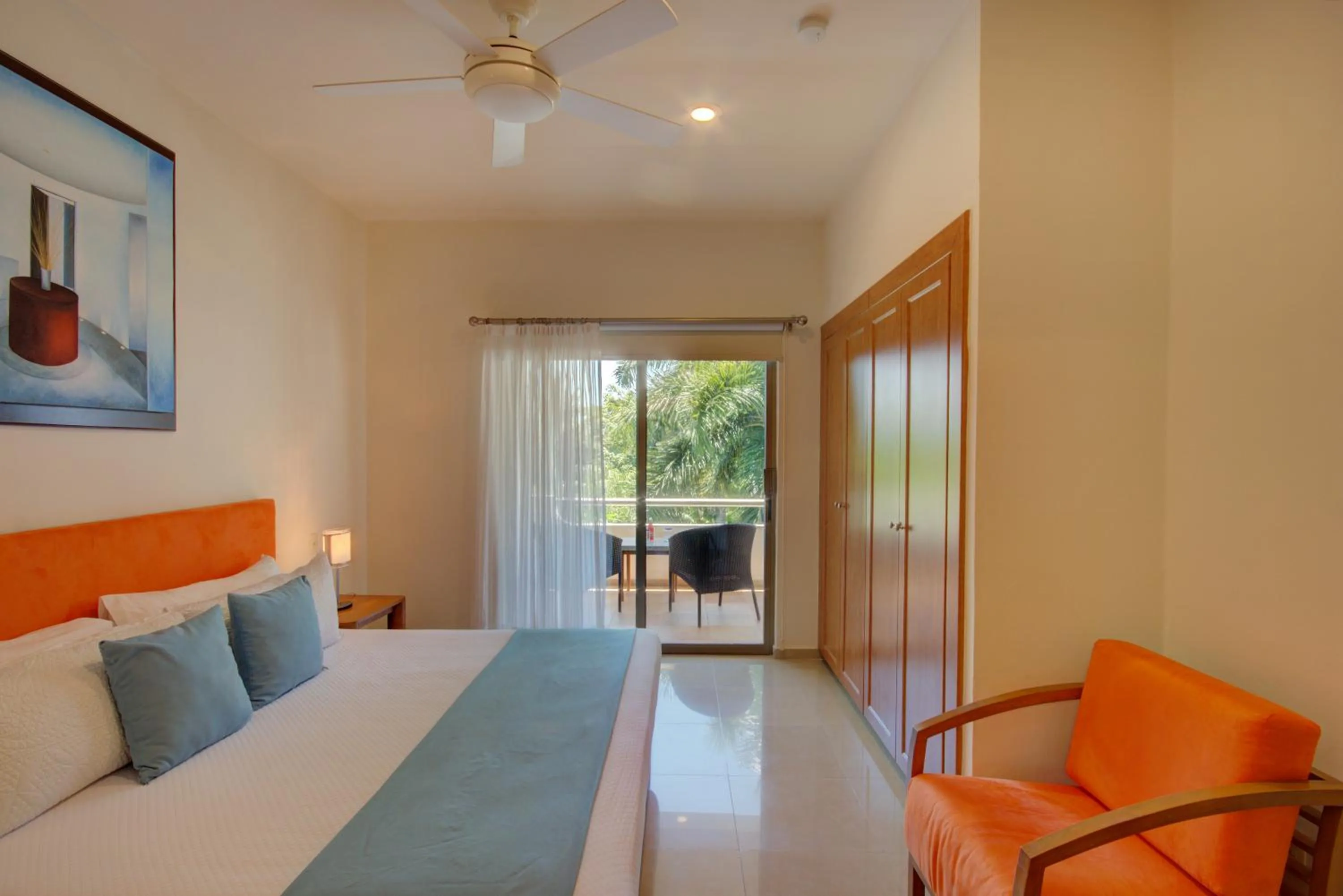 Bed in Riviera Maya Suites