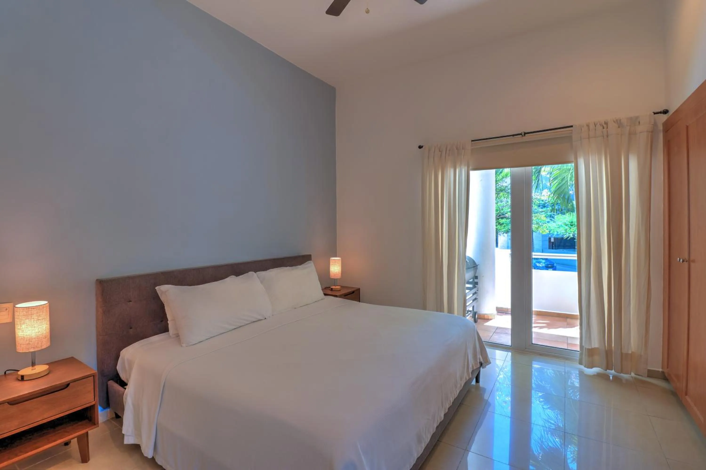 Bed in Riviera Maya Suites