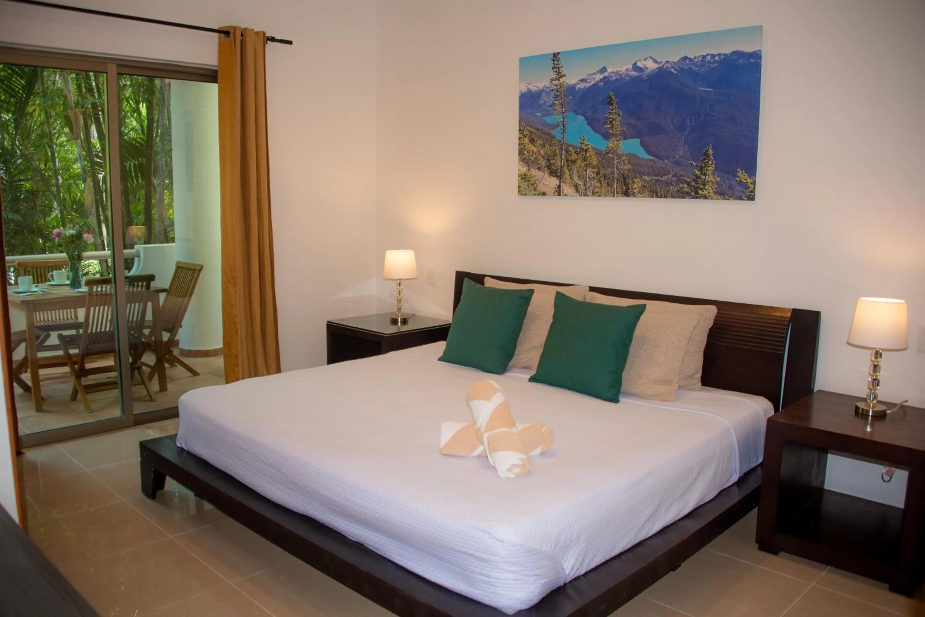 Bed in Riviera Maya Suites