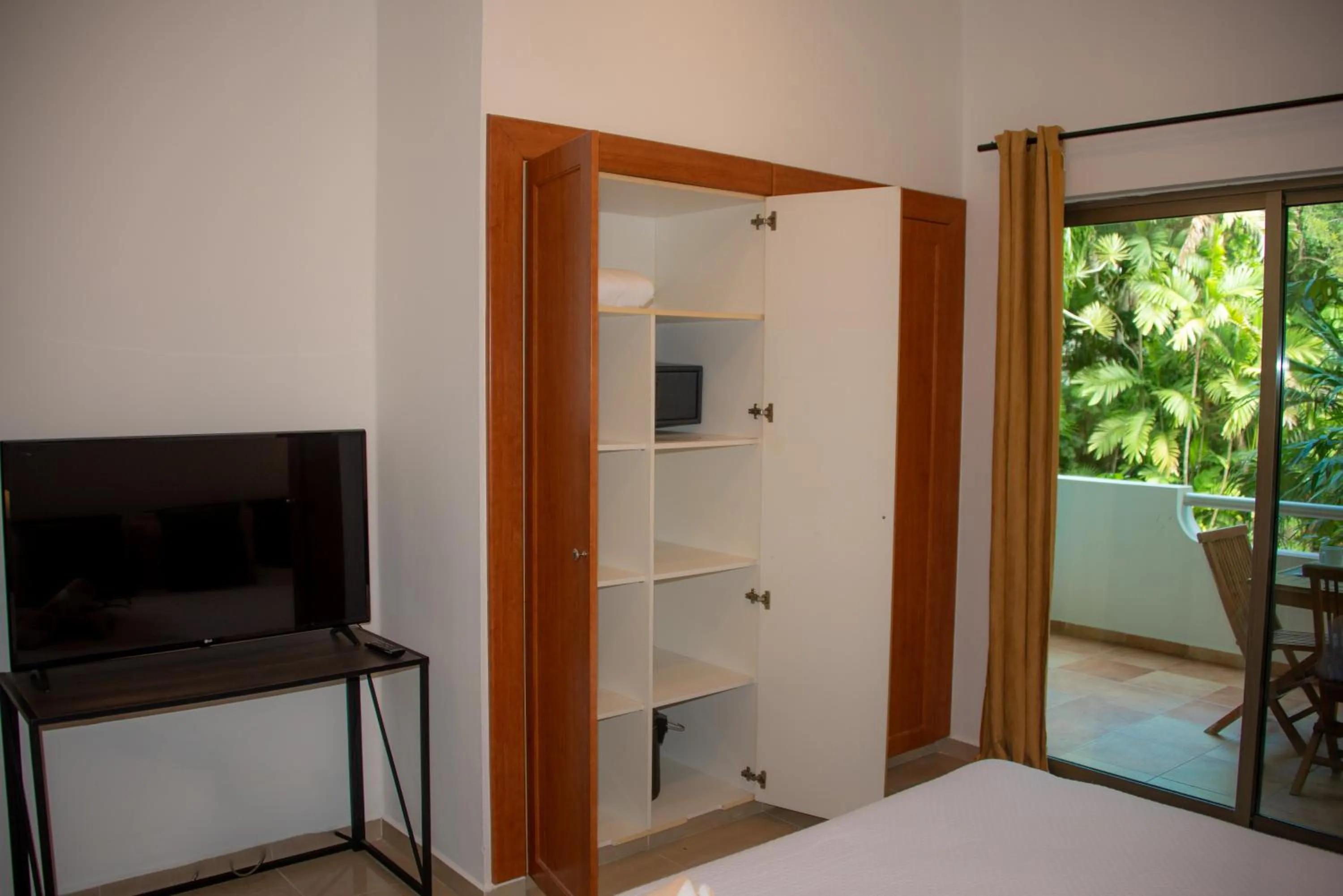 Bed in Riviera Maya Suites