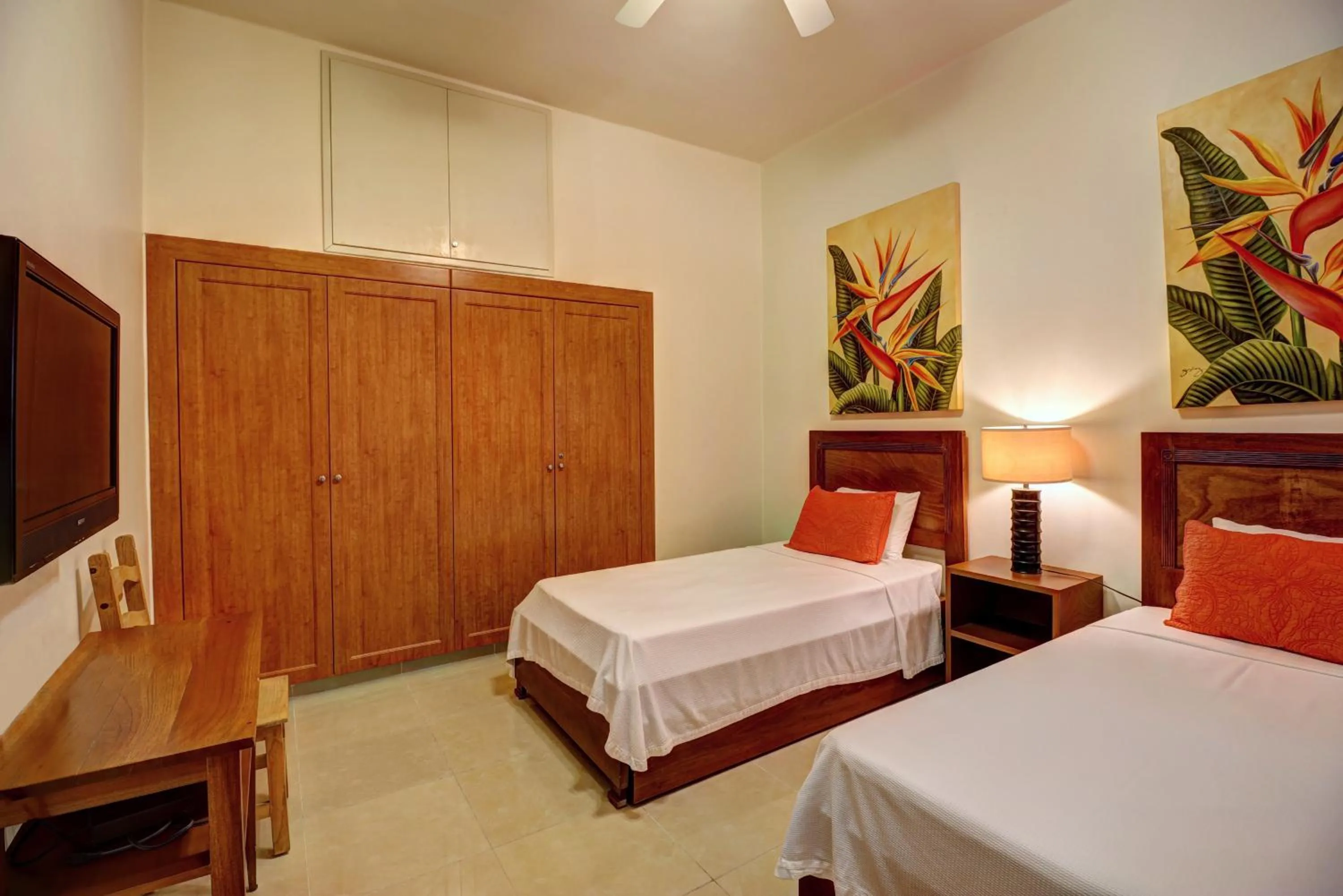 Bed in Riviera Maya Suites