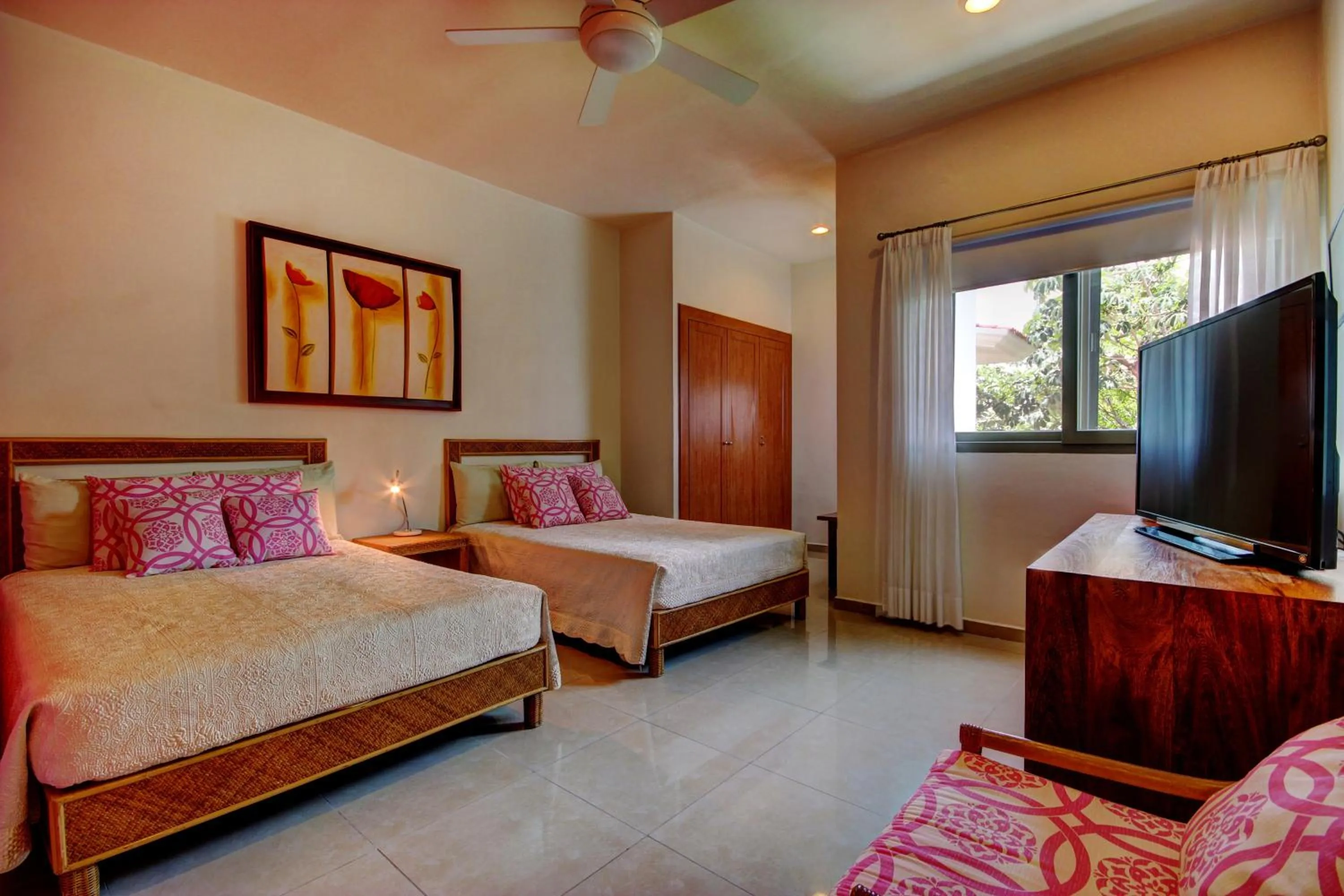 Bed in Riviera Maya Suites