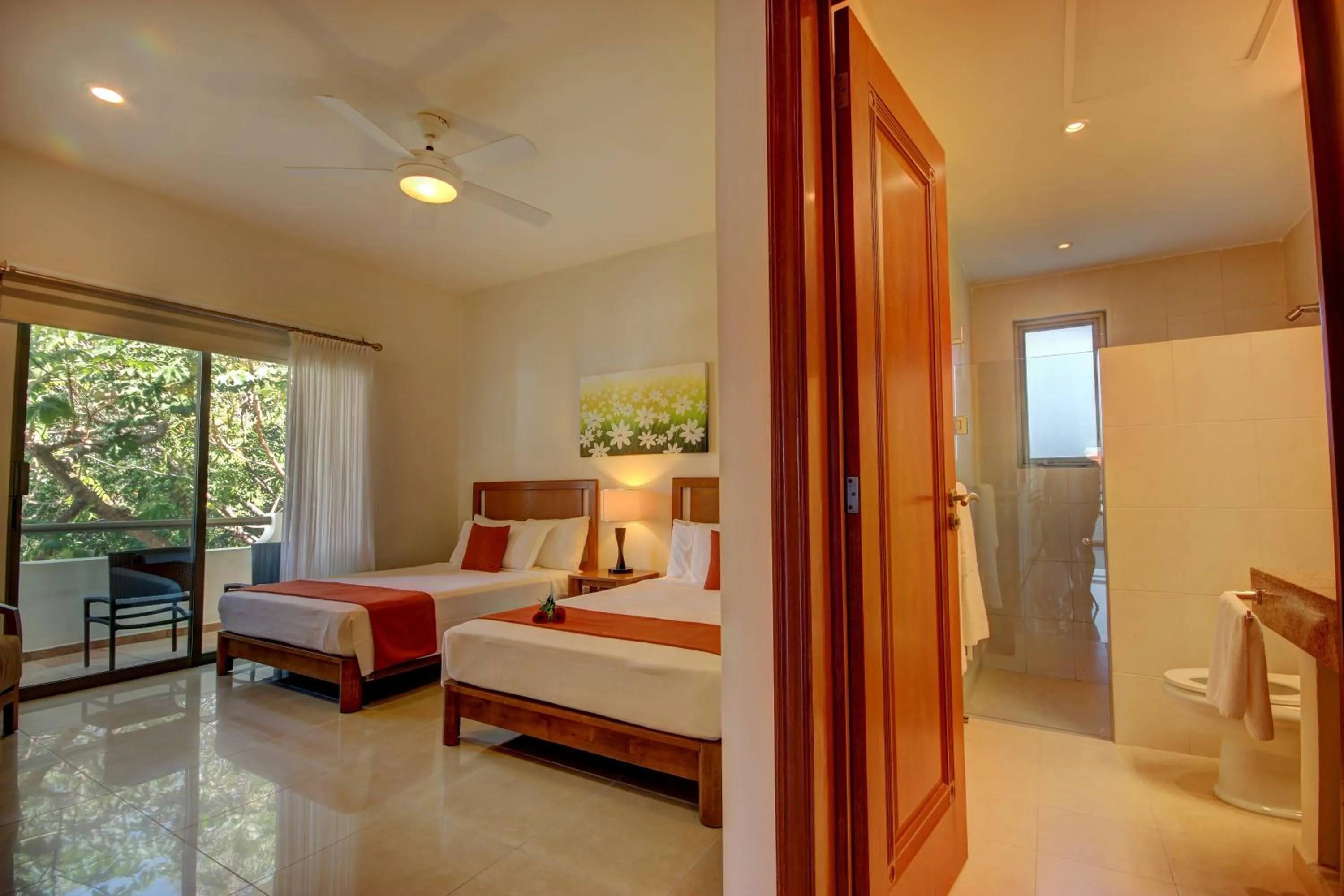Bed in Riviera Maya Suites