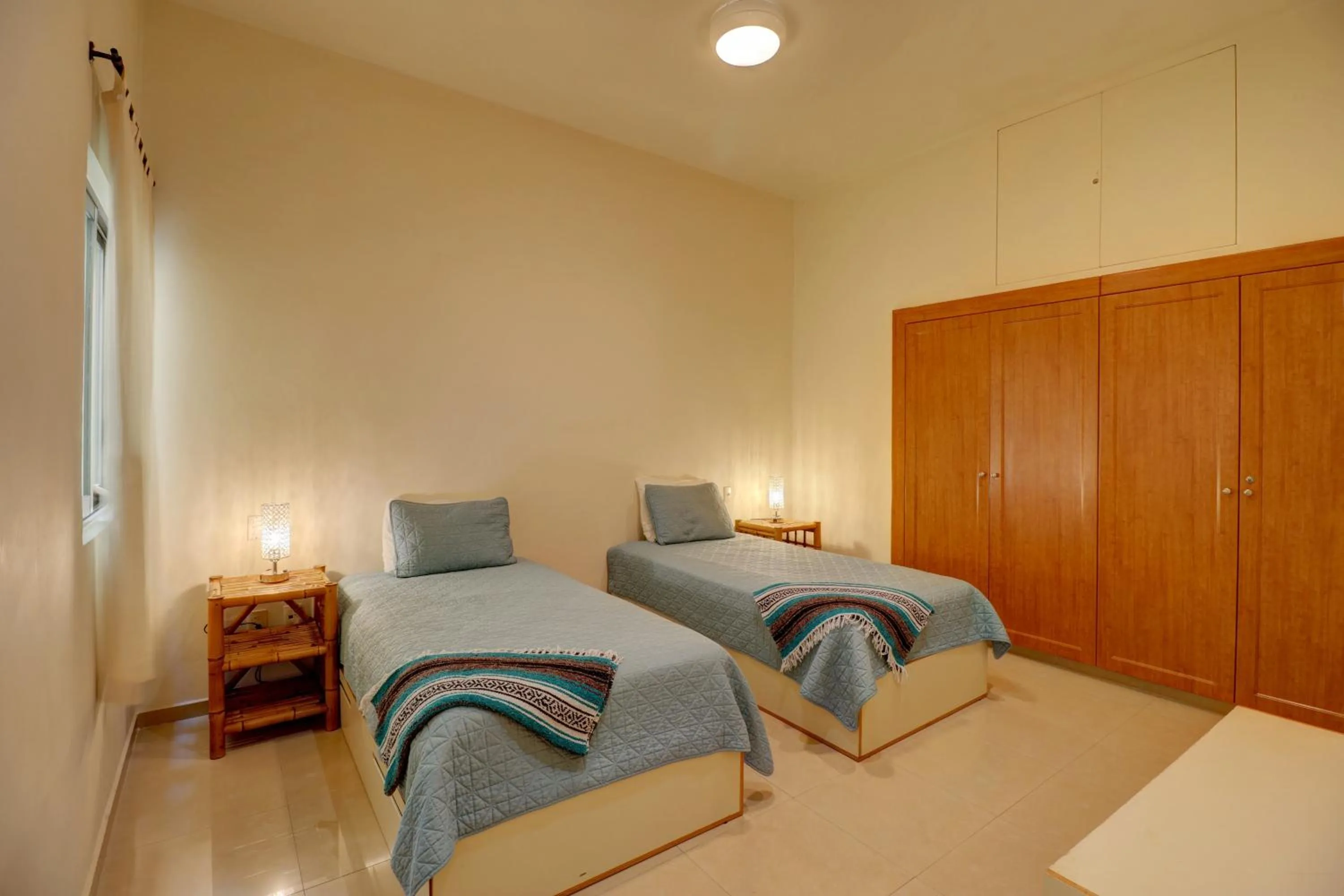 Bed in Riviera Maya Suites