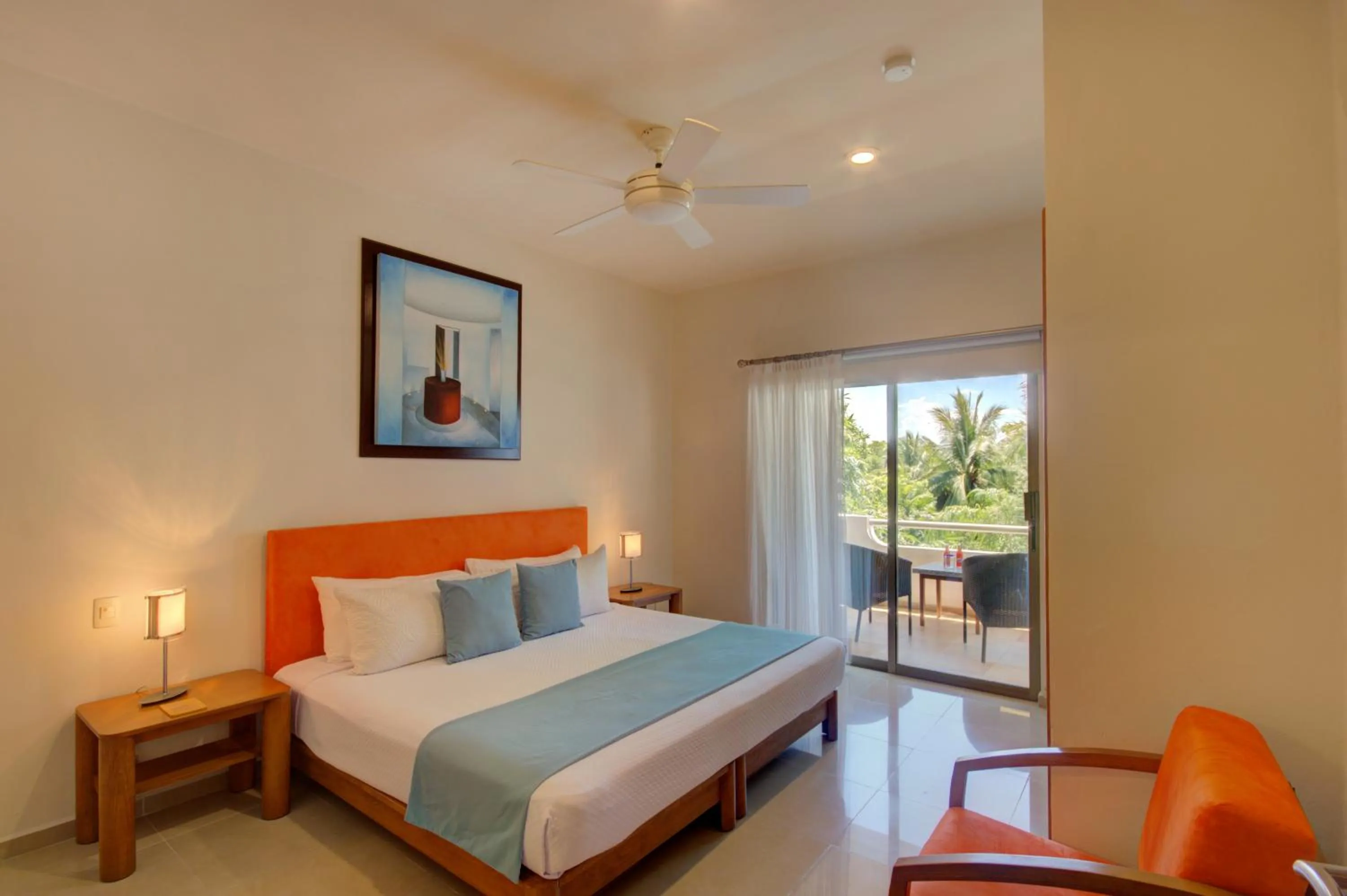 Bed in Riviera Maya Suites