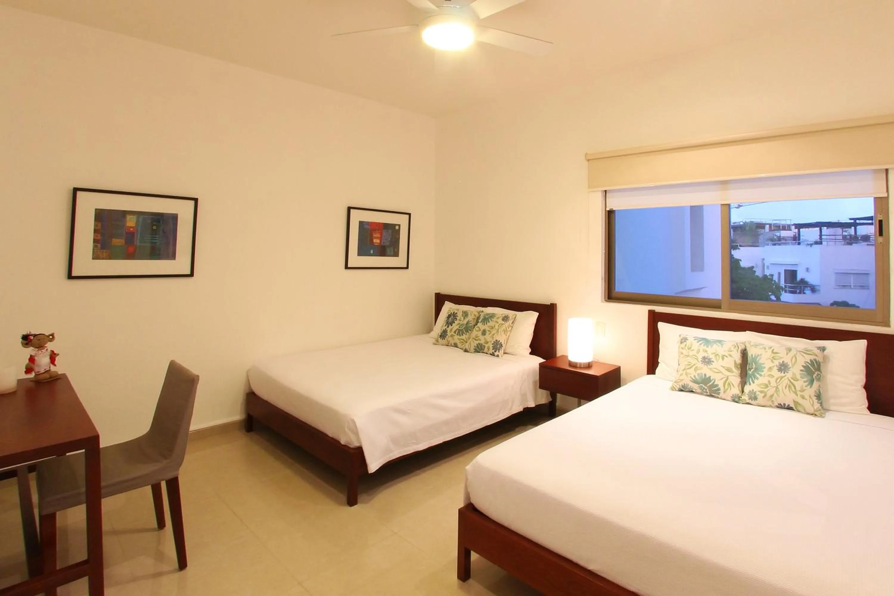 Bed in Riviera Maya Suites