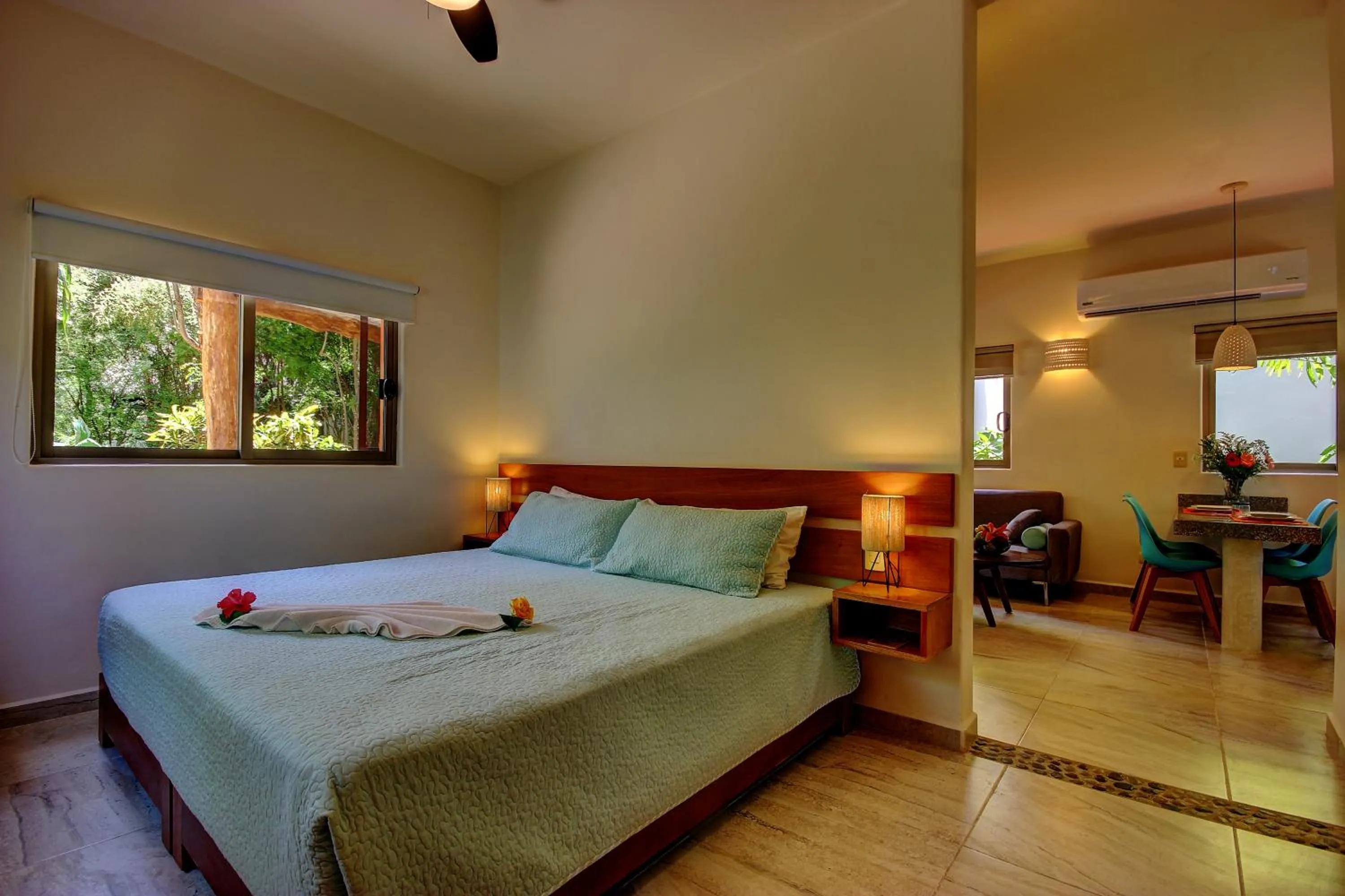 Bed in Riviera Maya Suites