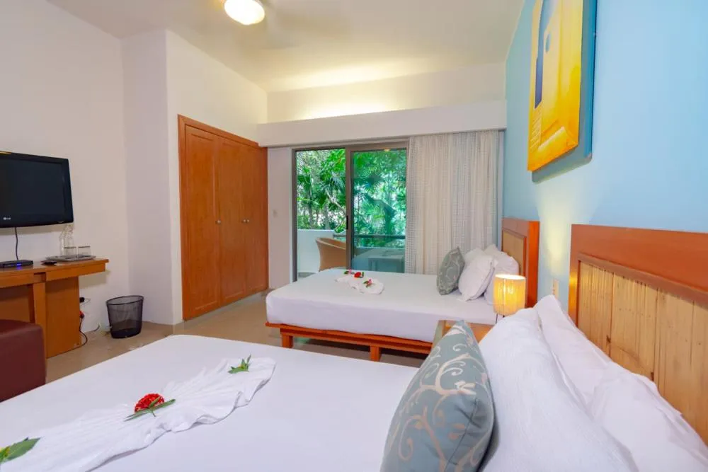 TV and multimedia, Bed in Riviera Maya Suites
