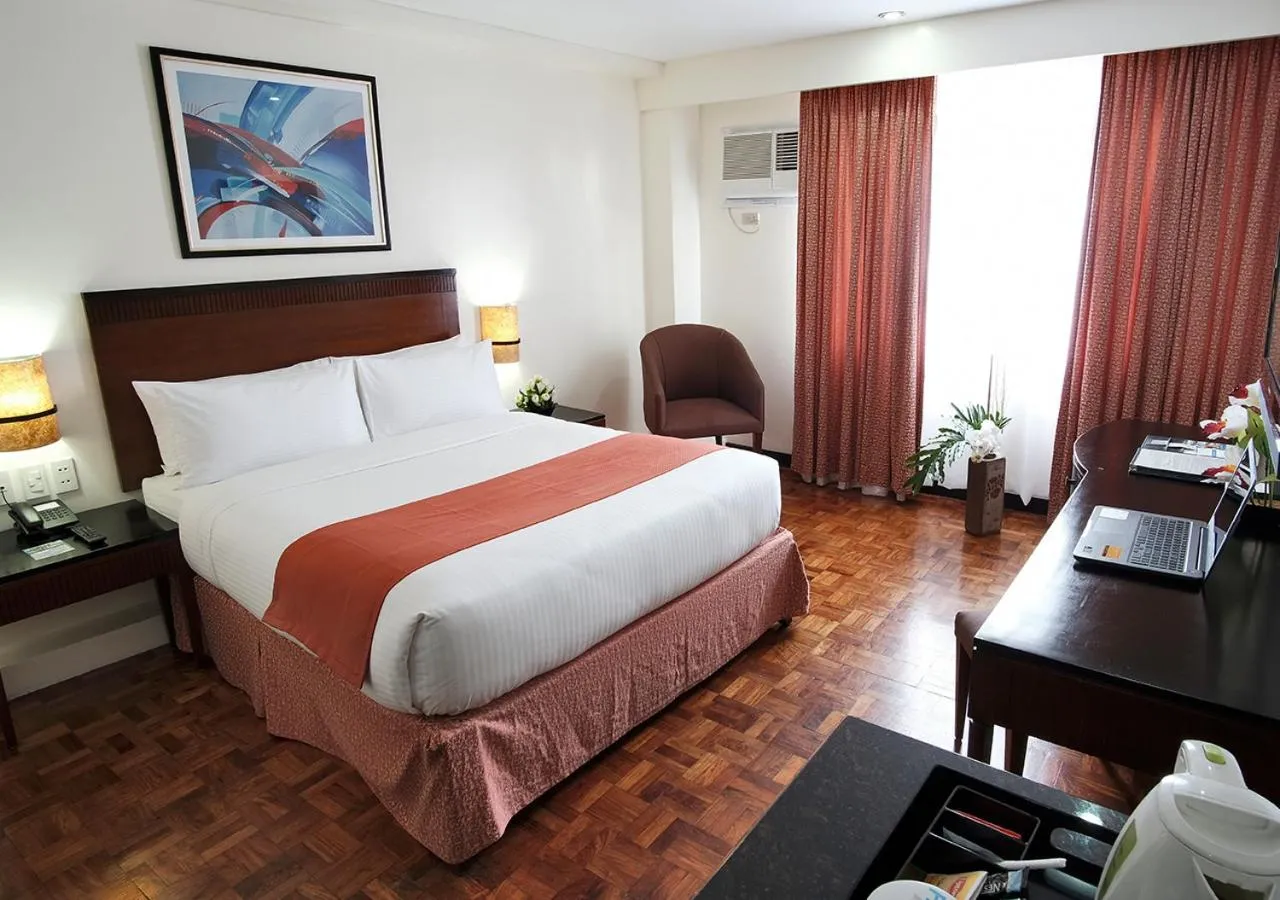 Bed in Fersal Hotel Neptune Makati