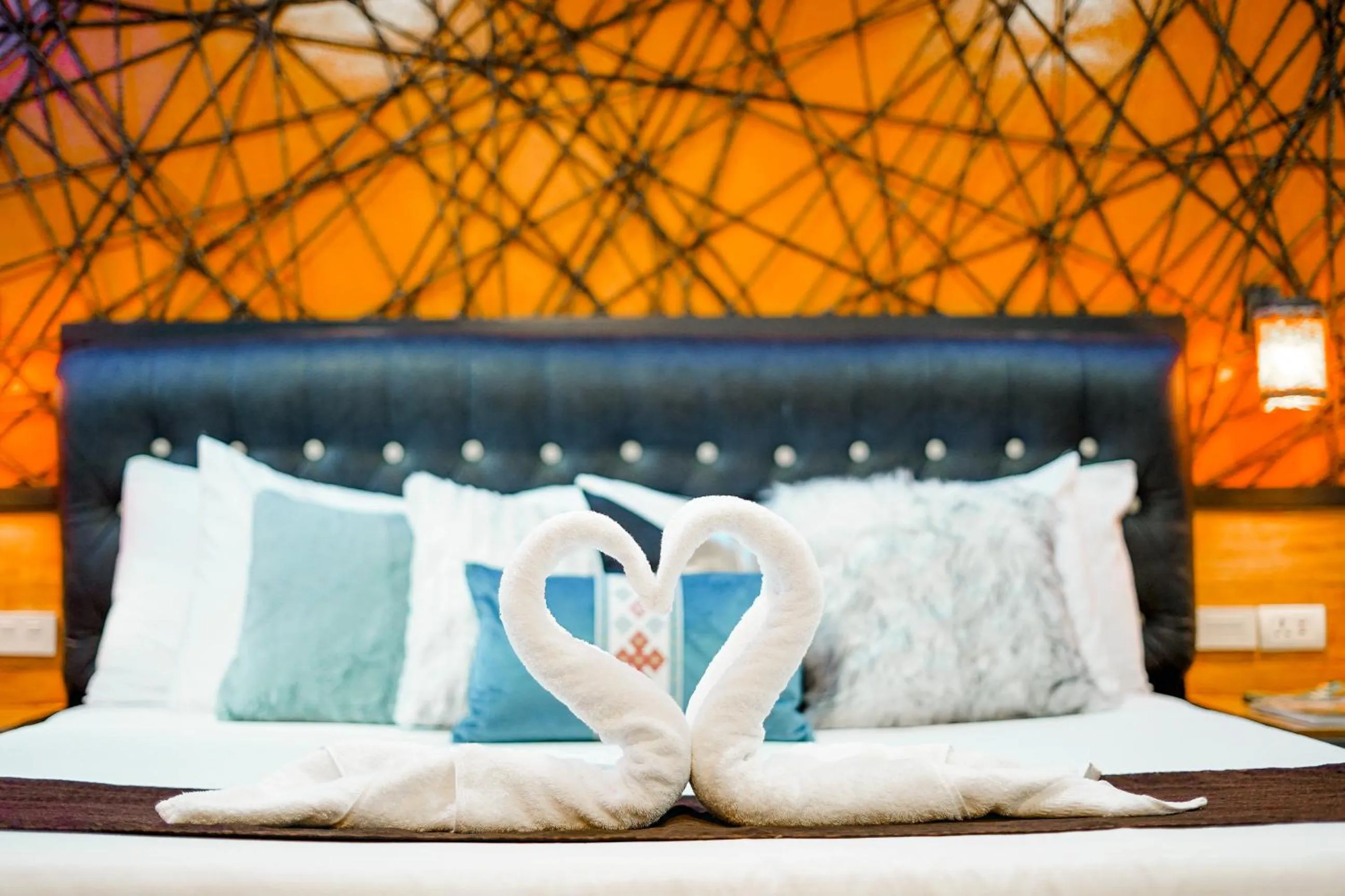 Bed in CLOCKWORKORANGE Luxury Suites