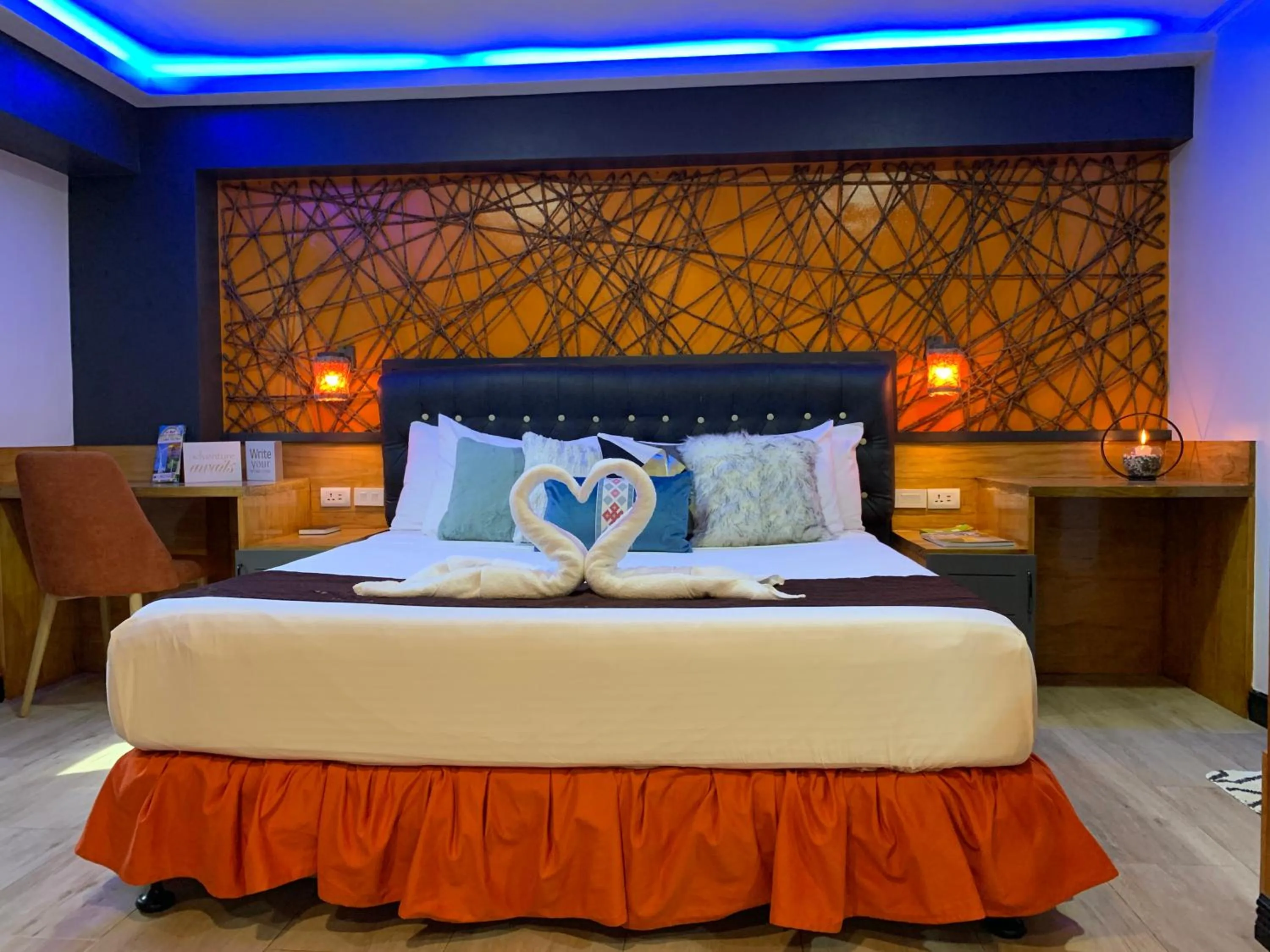 Bed in CLOCKWORKORANGE Luxury Suites