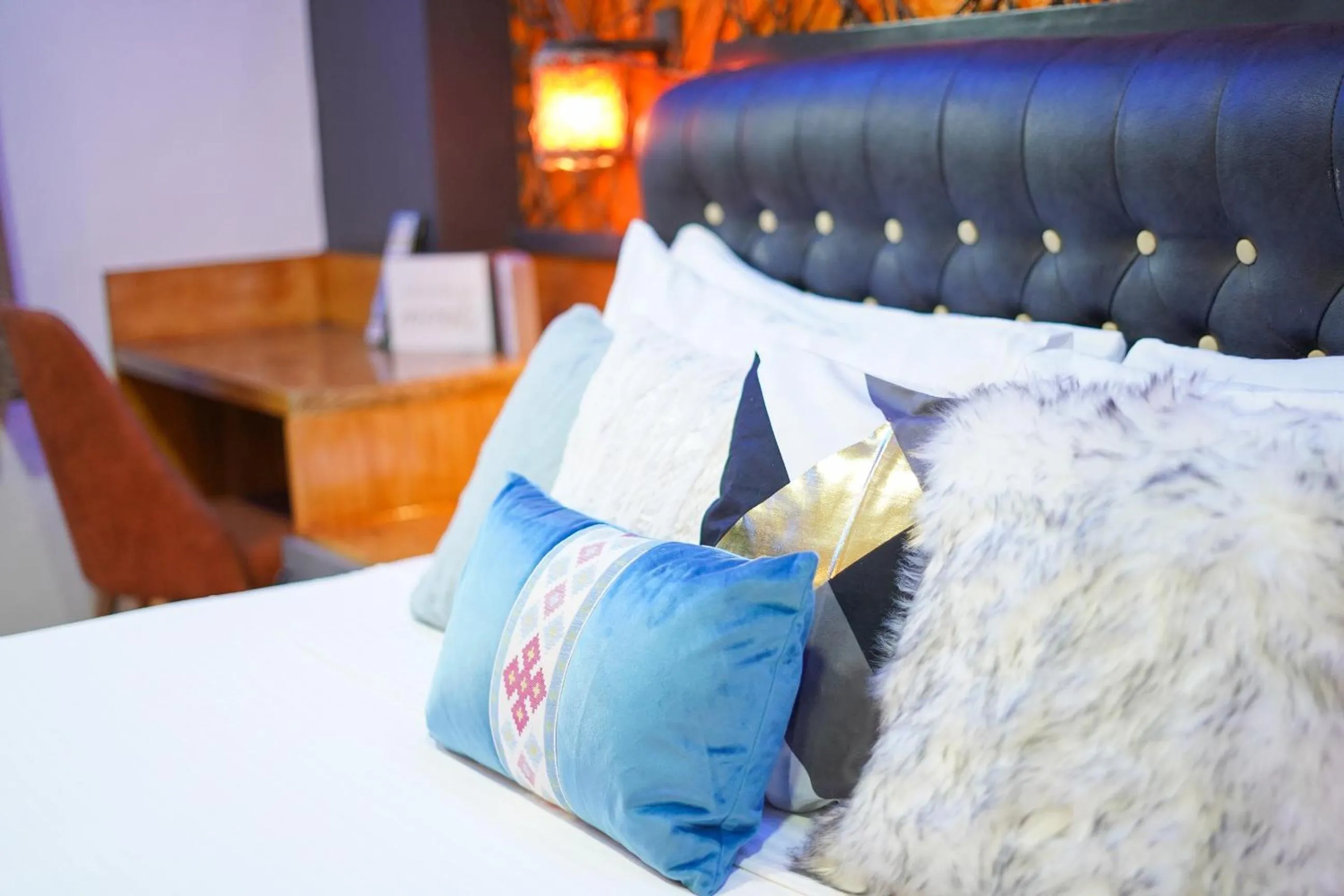 Bed in CLOCKWORKORANGE Luxury Suites