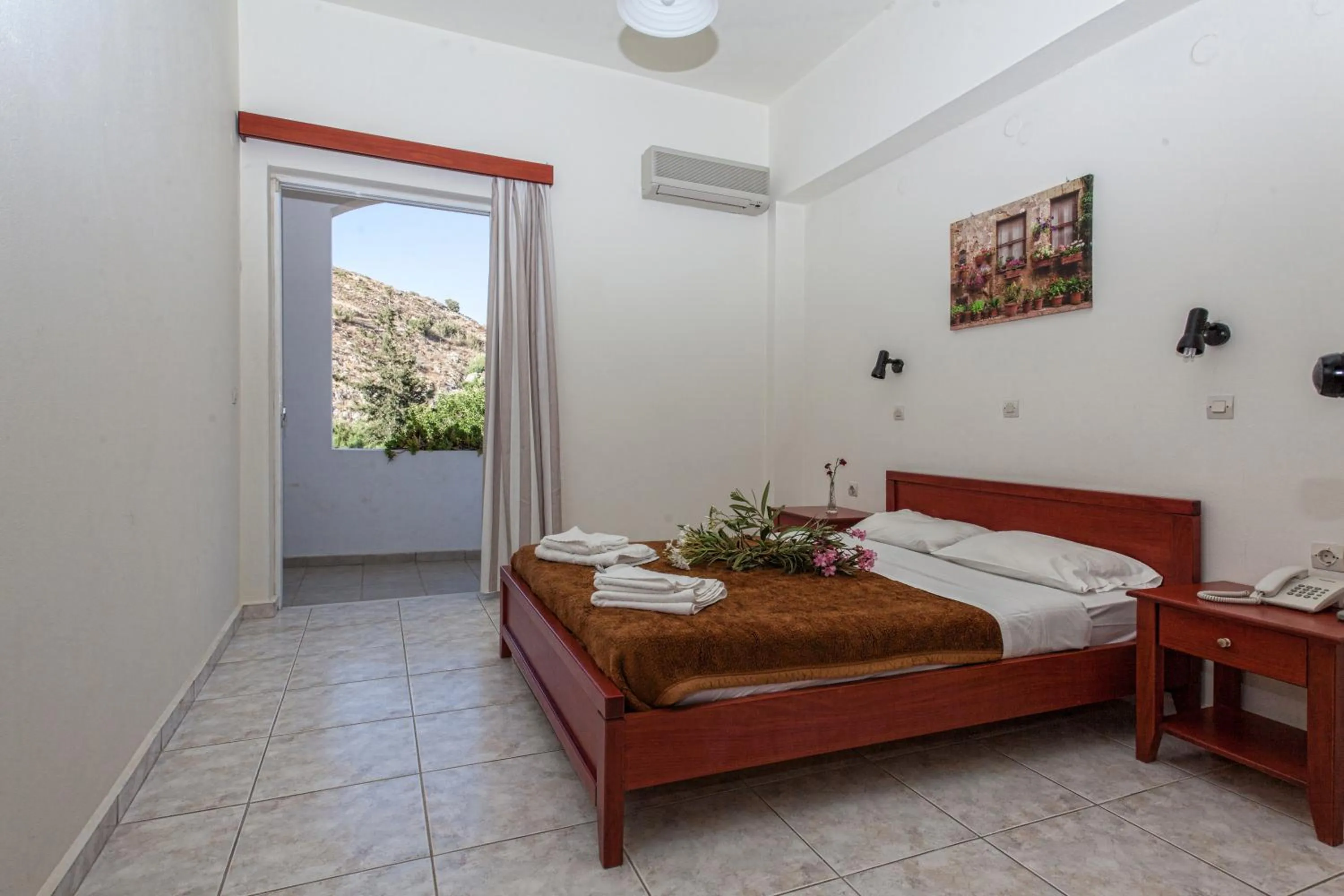 Bed in Ammoudi Hotel