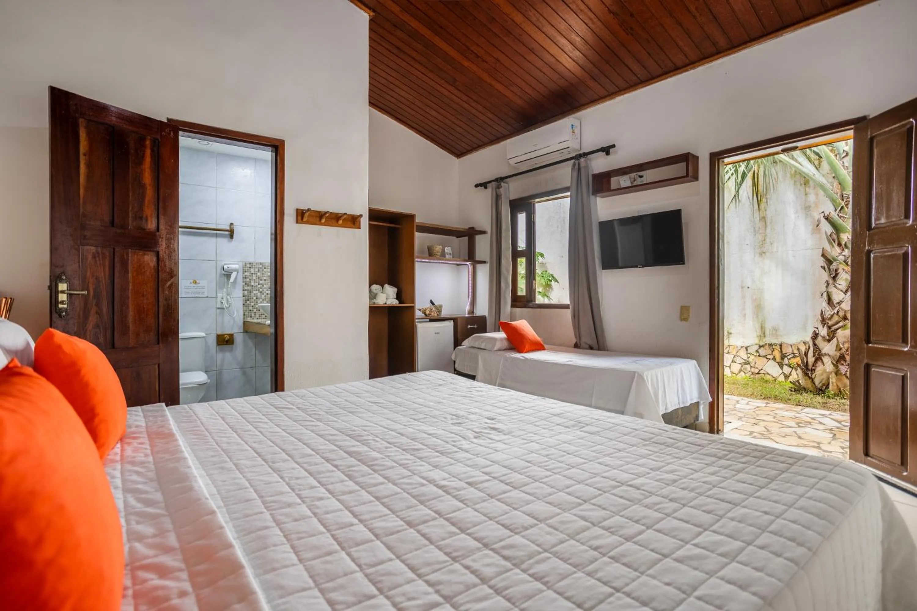 Bed in Jeri Village Hotel