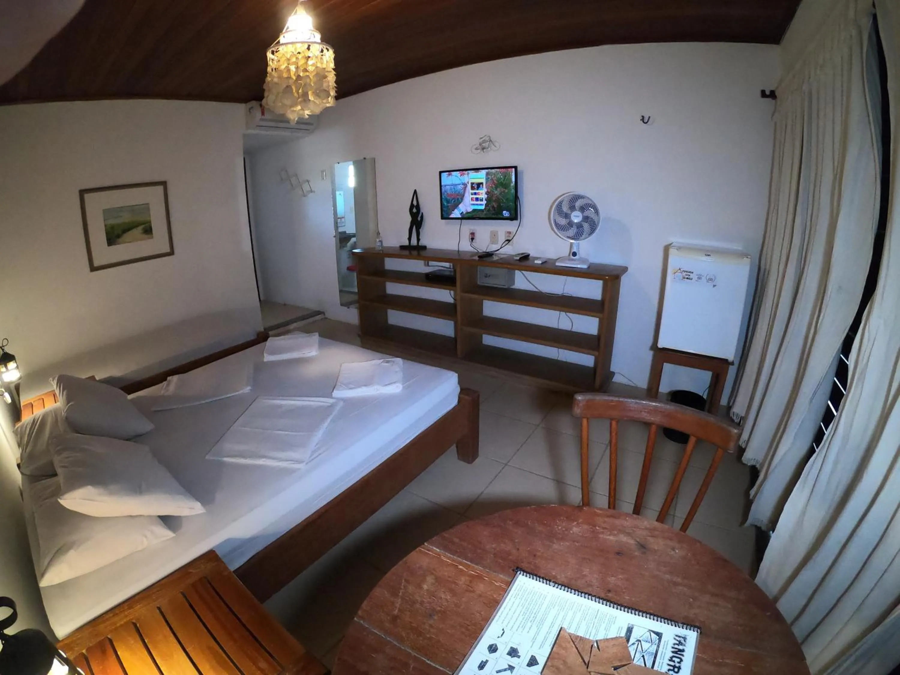 Bed in Pousada Casa Do Angelo