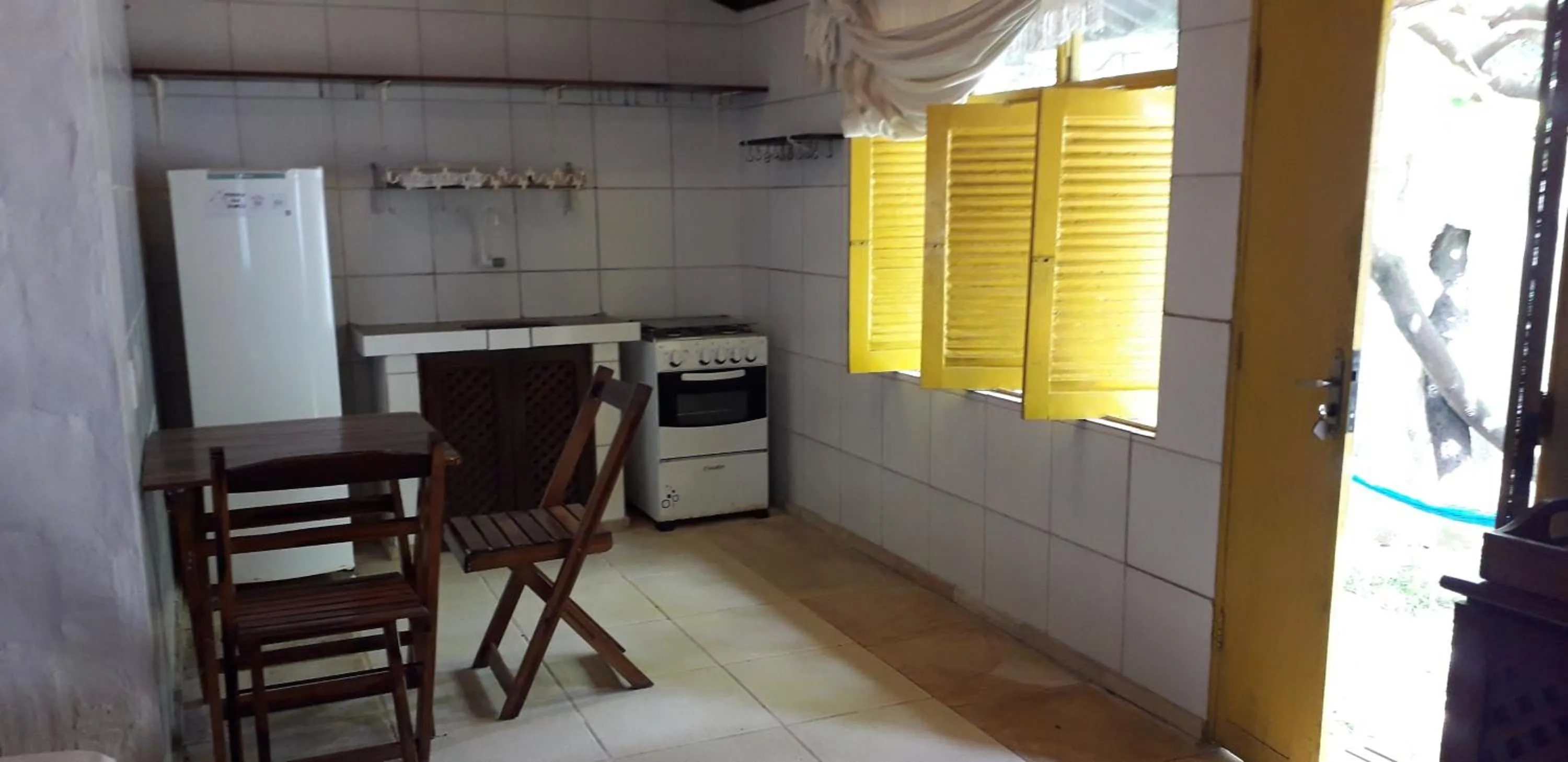 Bed in Pousada Casa Do Angelo