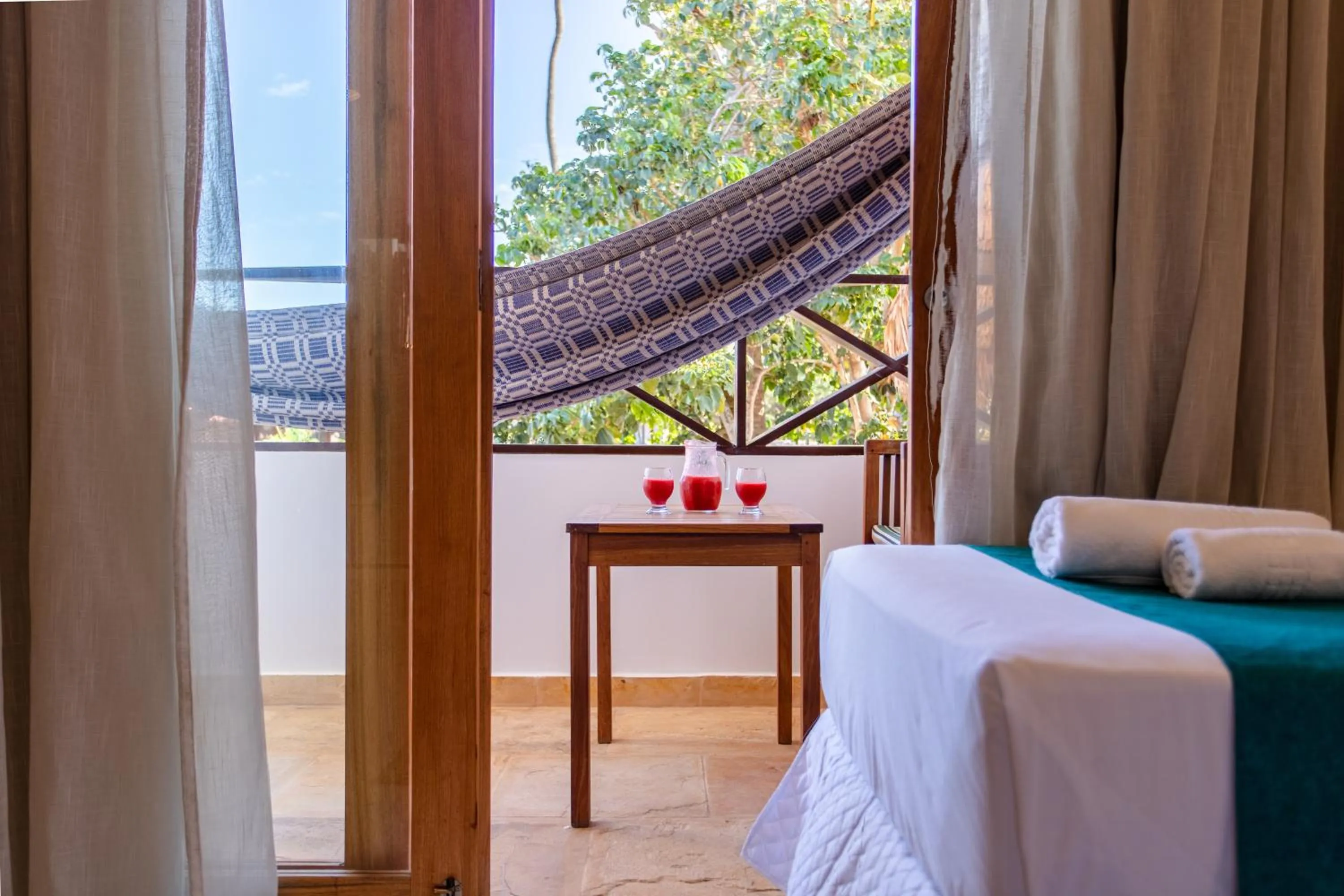 Bed in Pousada Capitão Thomaz