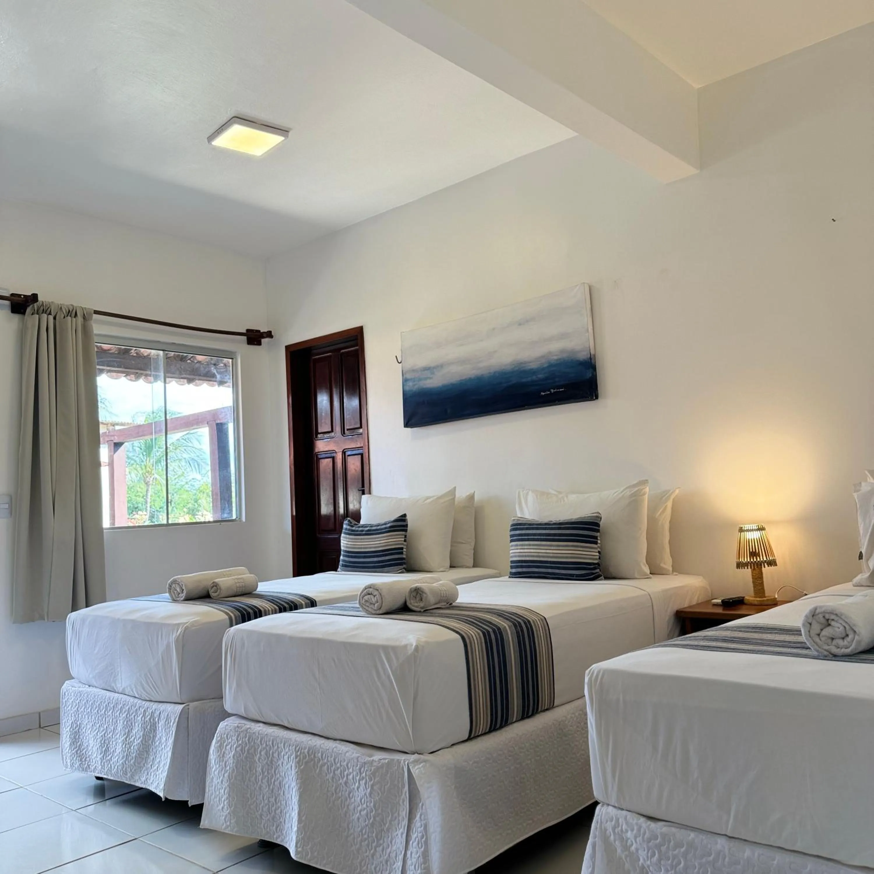 Bed in Pousada Capitão Thomaz