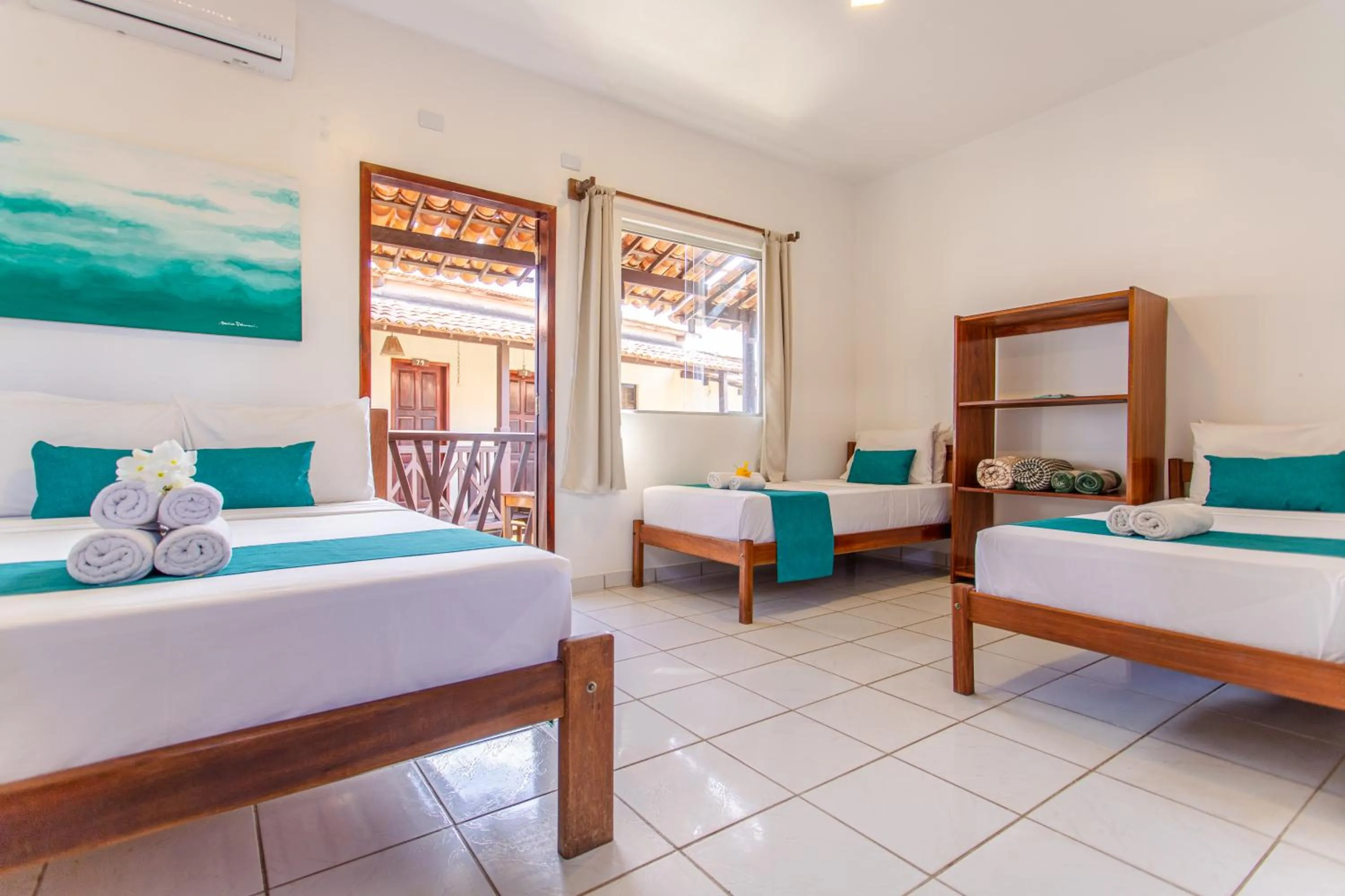 Bed in Pousada Capitão Thomaz