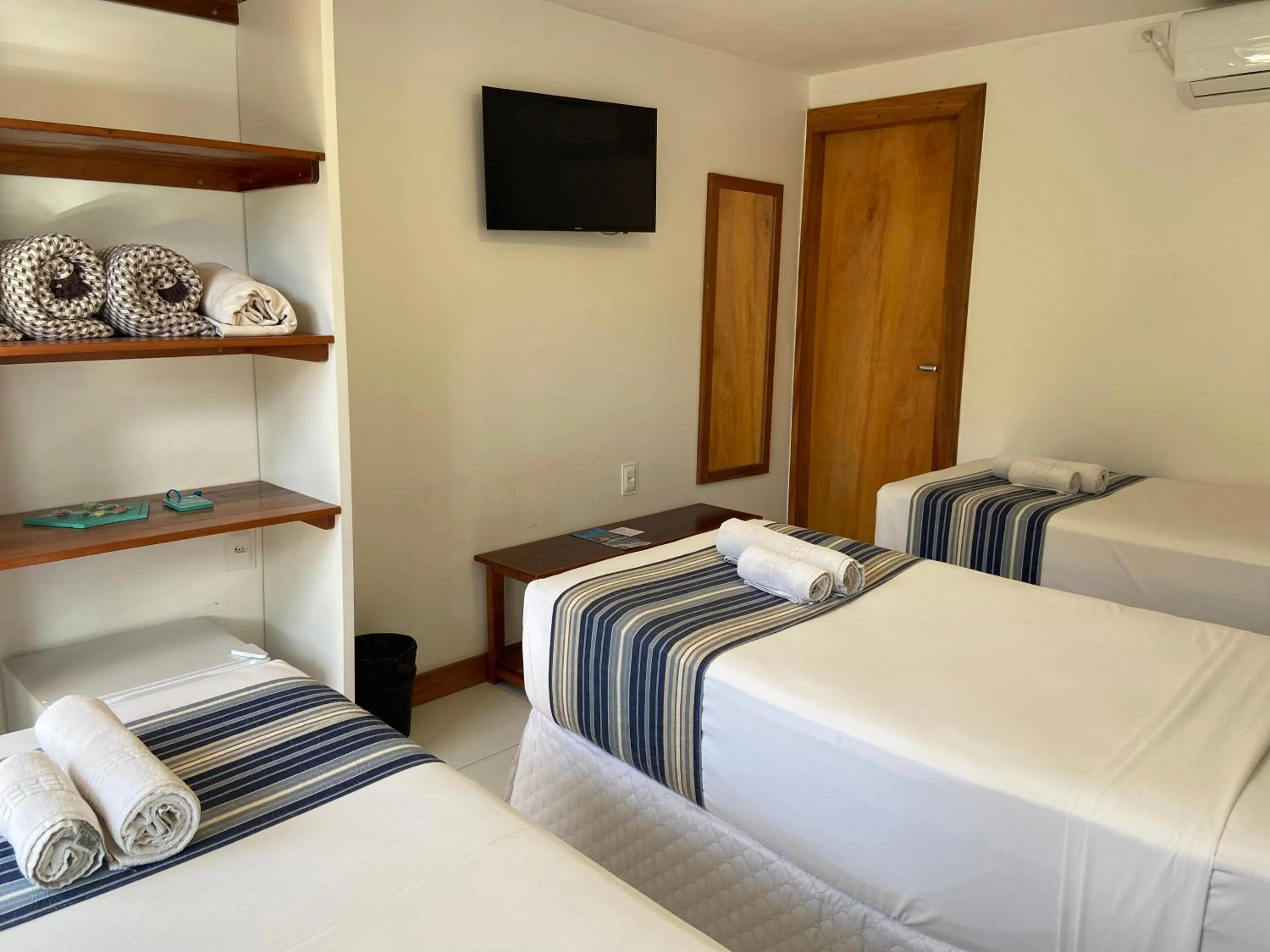 Bed in Pousada Capitão Thomaz