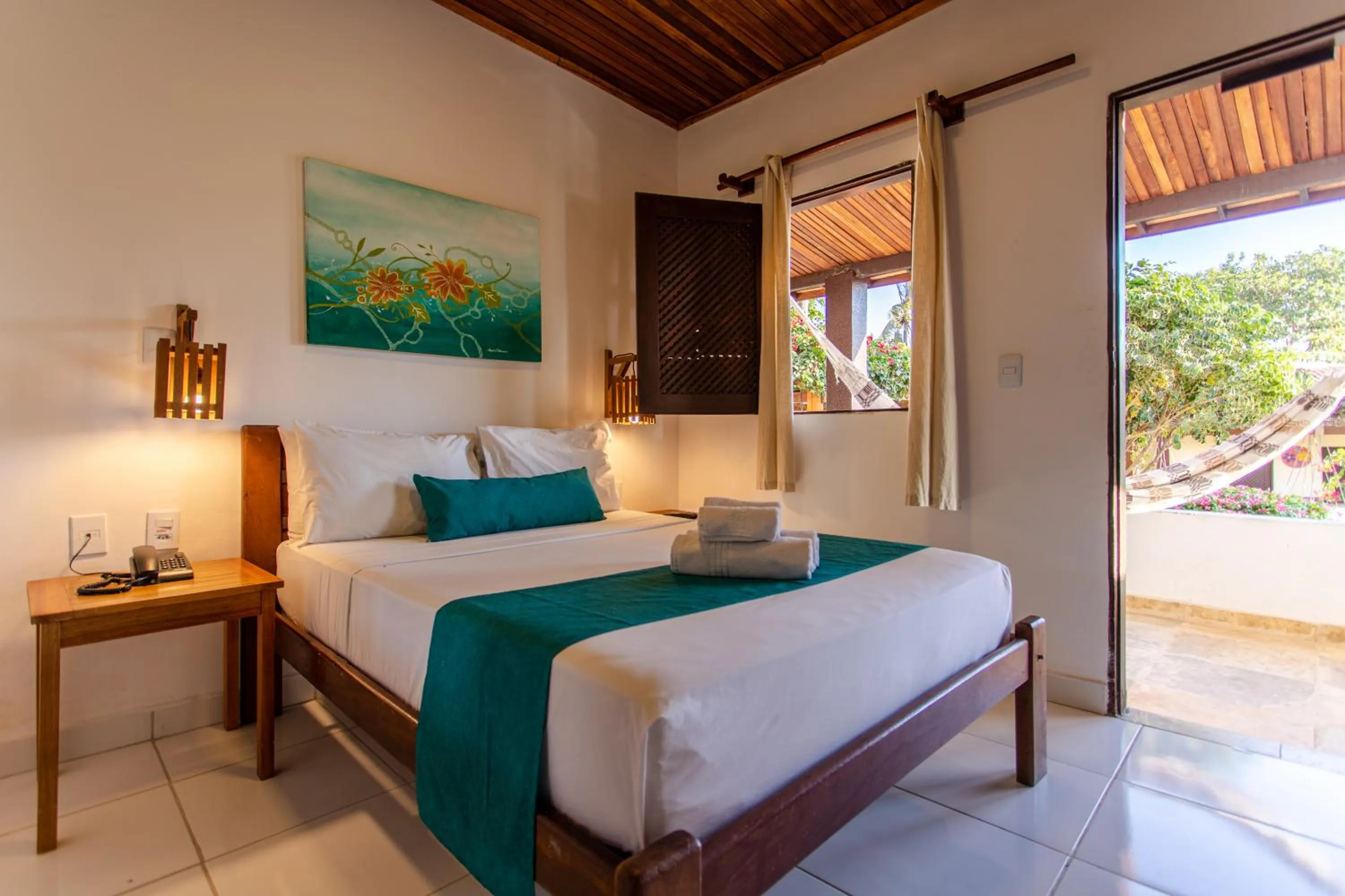 Bed in Pousada Capitão Thomaz