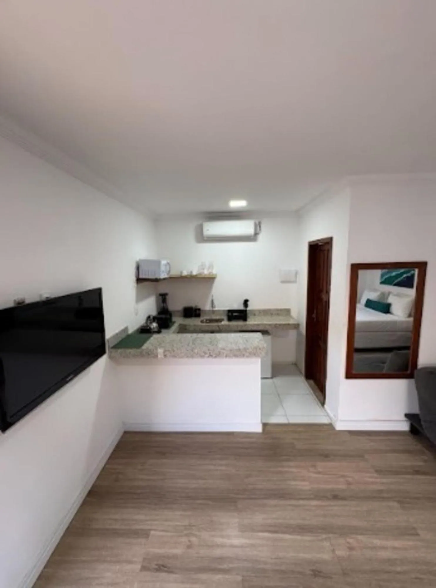 Kitchen or kitchenette in Pousada Capitão Thomaz