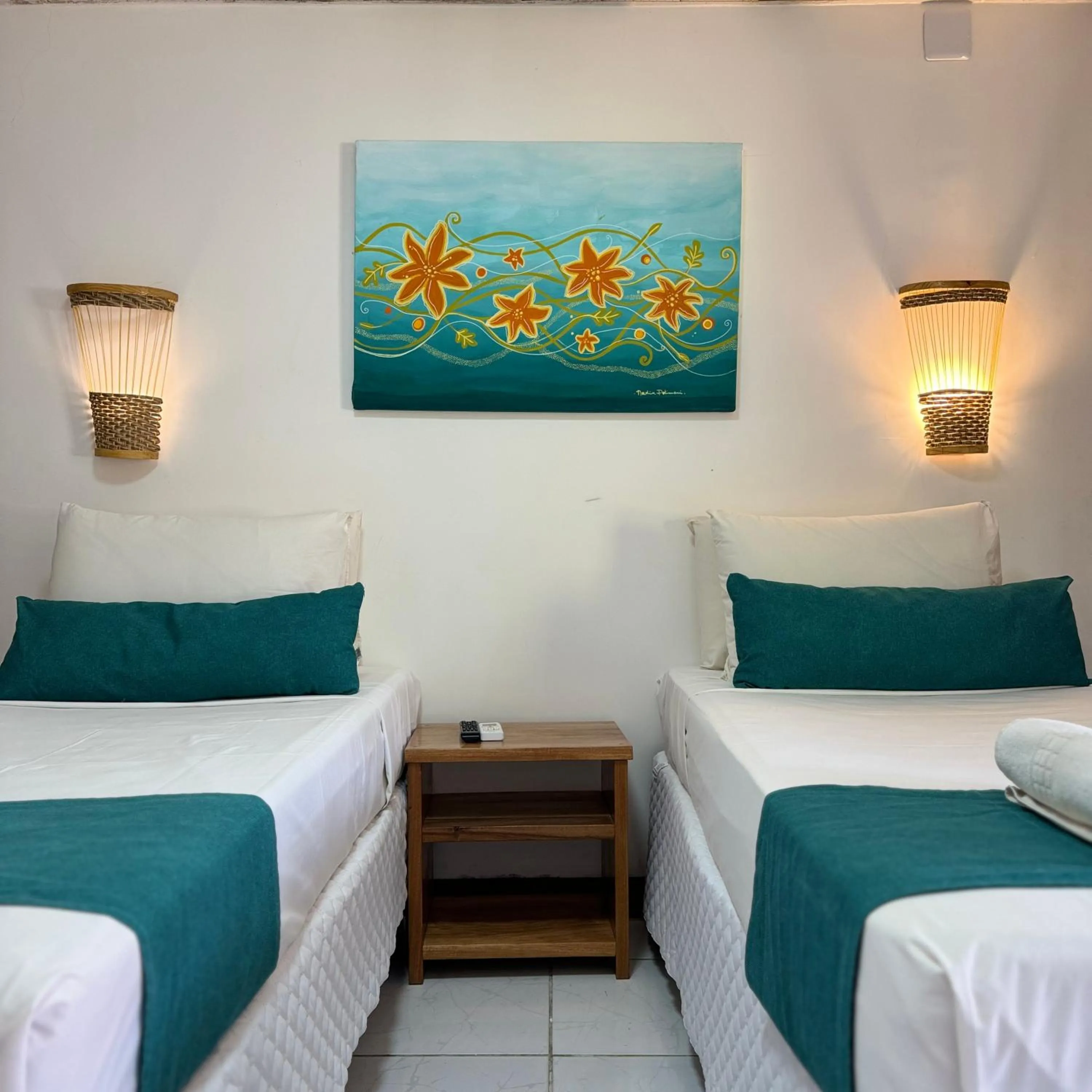 Bed in Pousada Capitão Thomaz