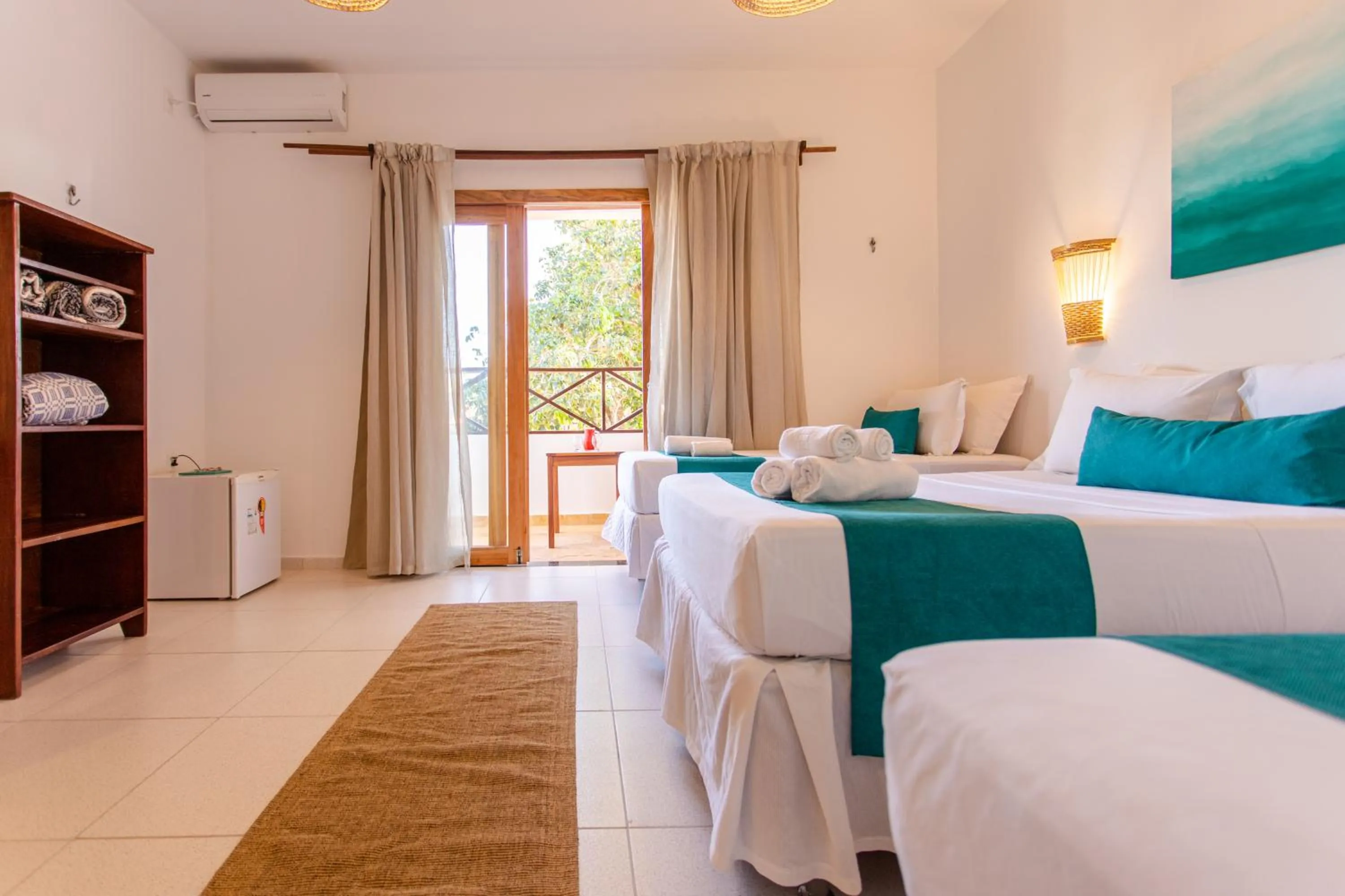 Bed in Pousada Capitão Thomaz