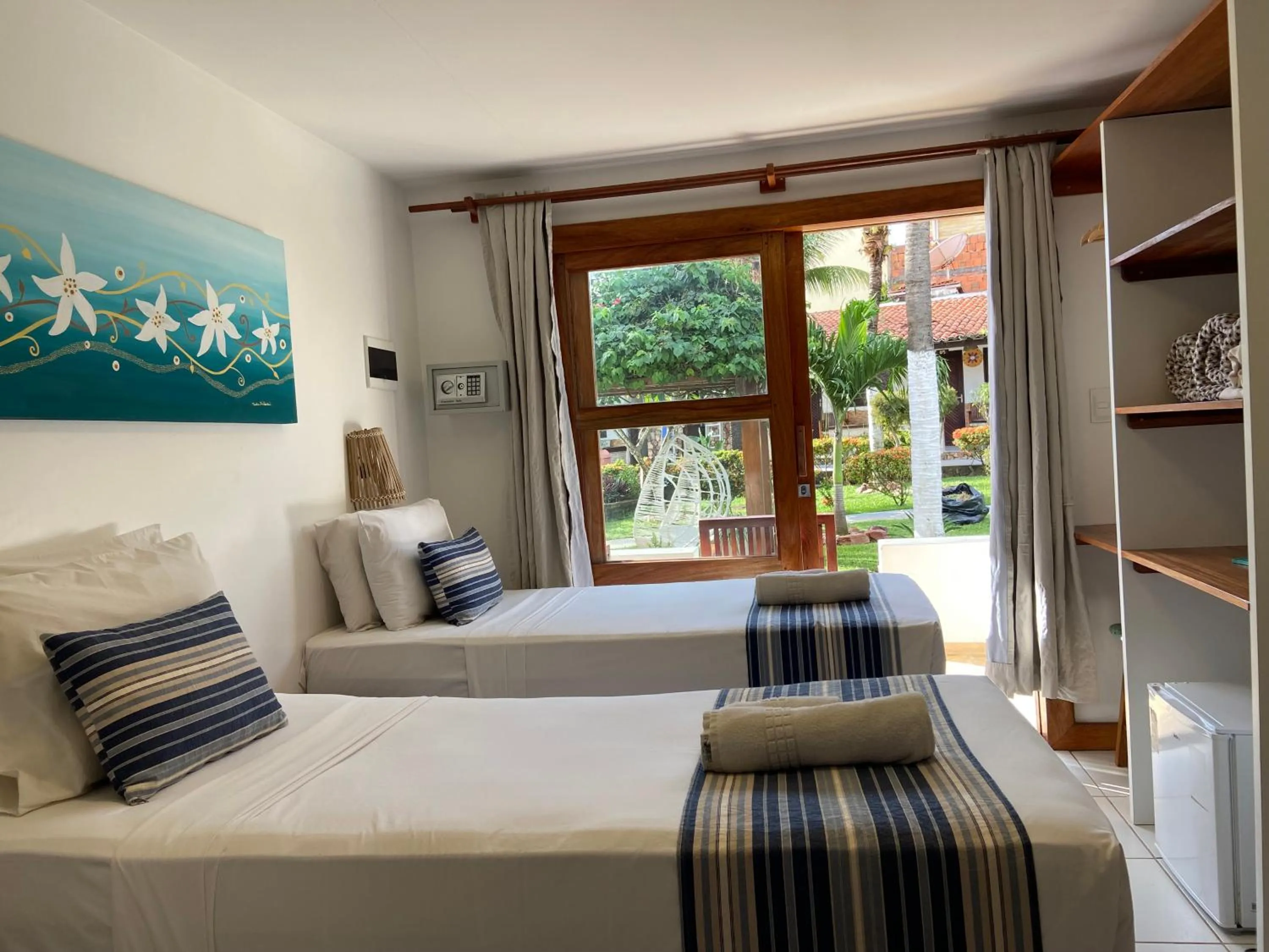 Bed in Pousada Capitão Thomaz