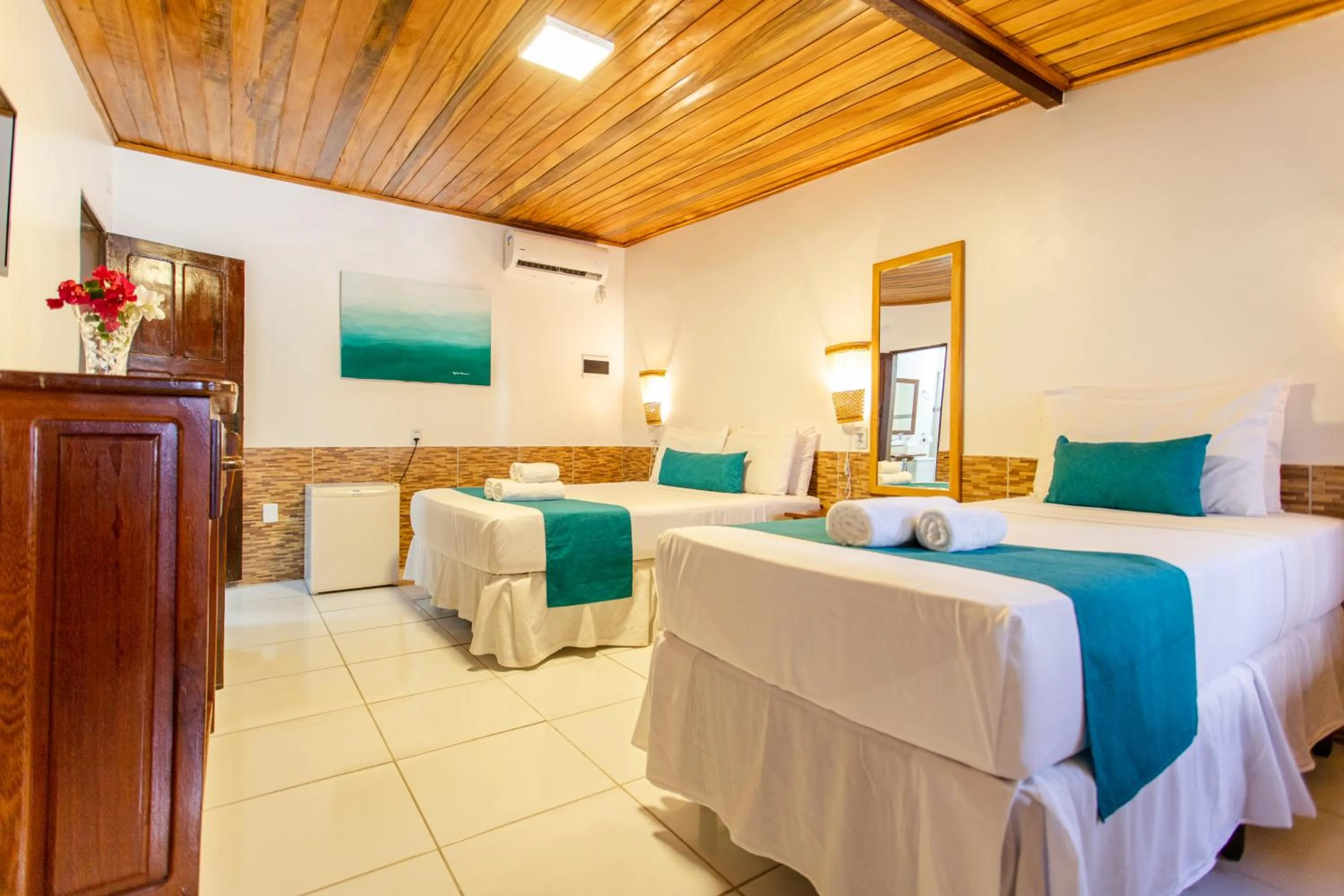 Bed in Pousada Capitão Thomaz