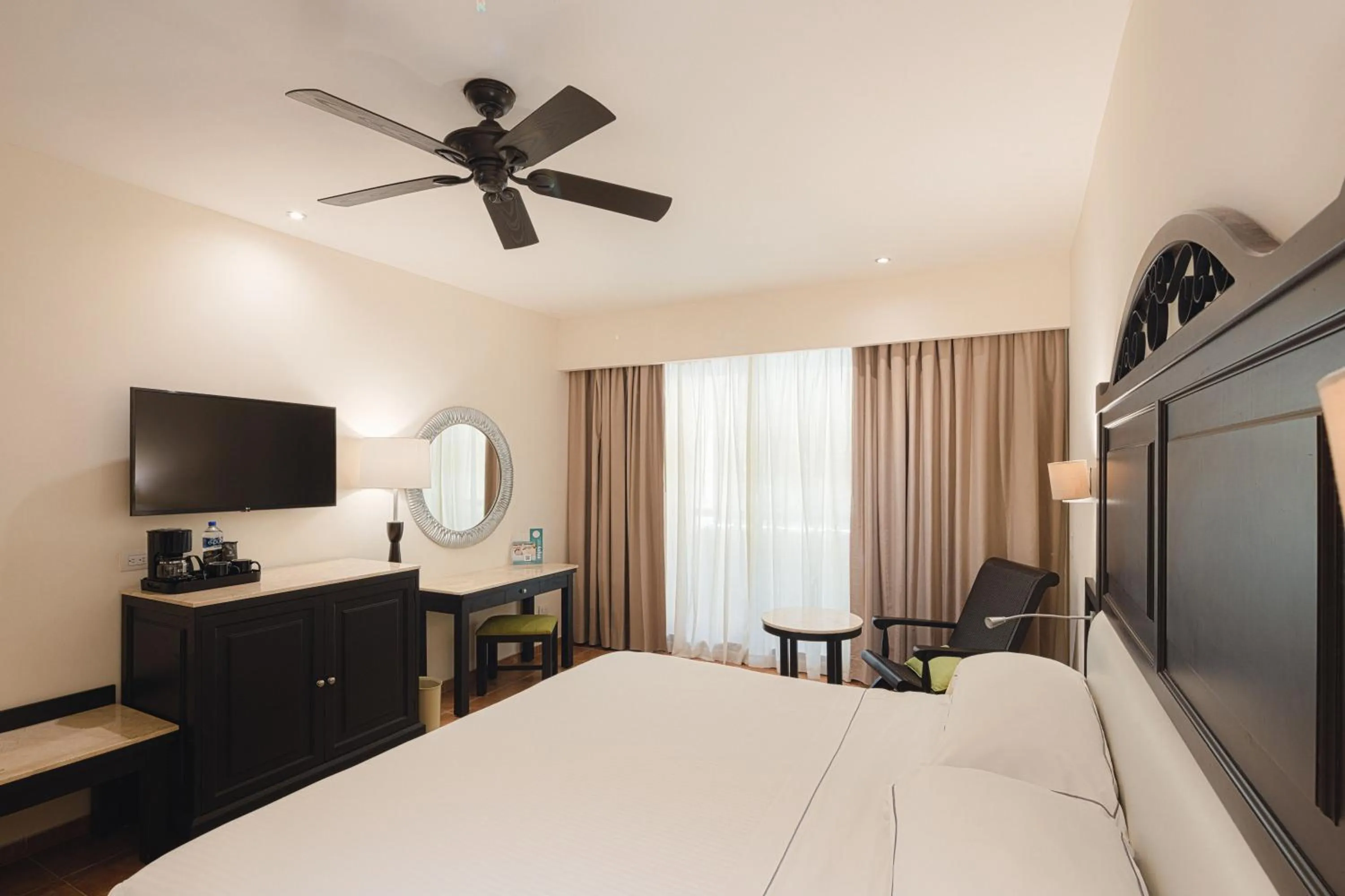 Photo of the whole room, Bed in Occidental at Xcaret Destination - All Inclusive