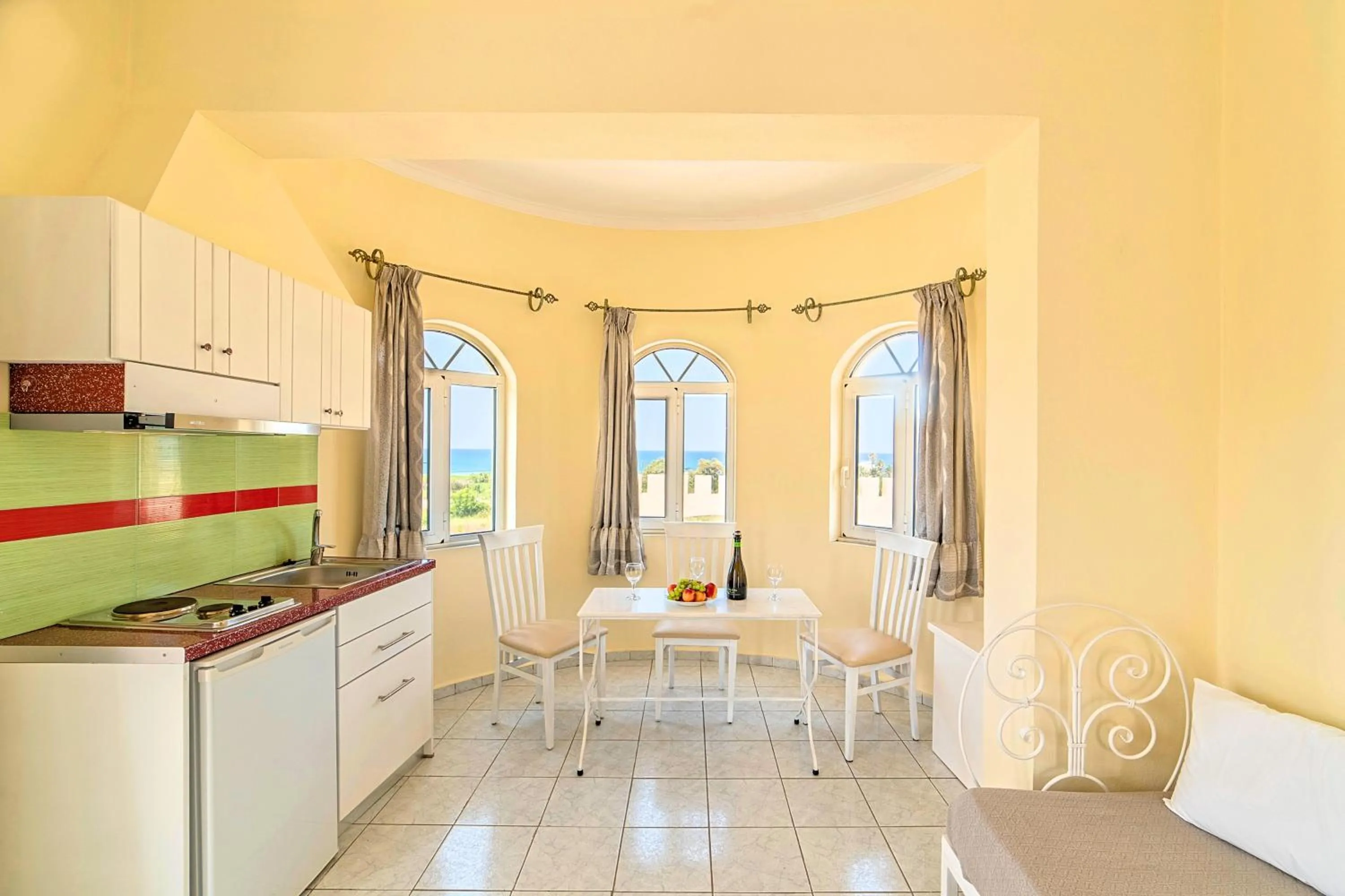 Kitchen or kitchenette in Palladion Hotel