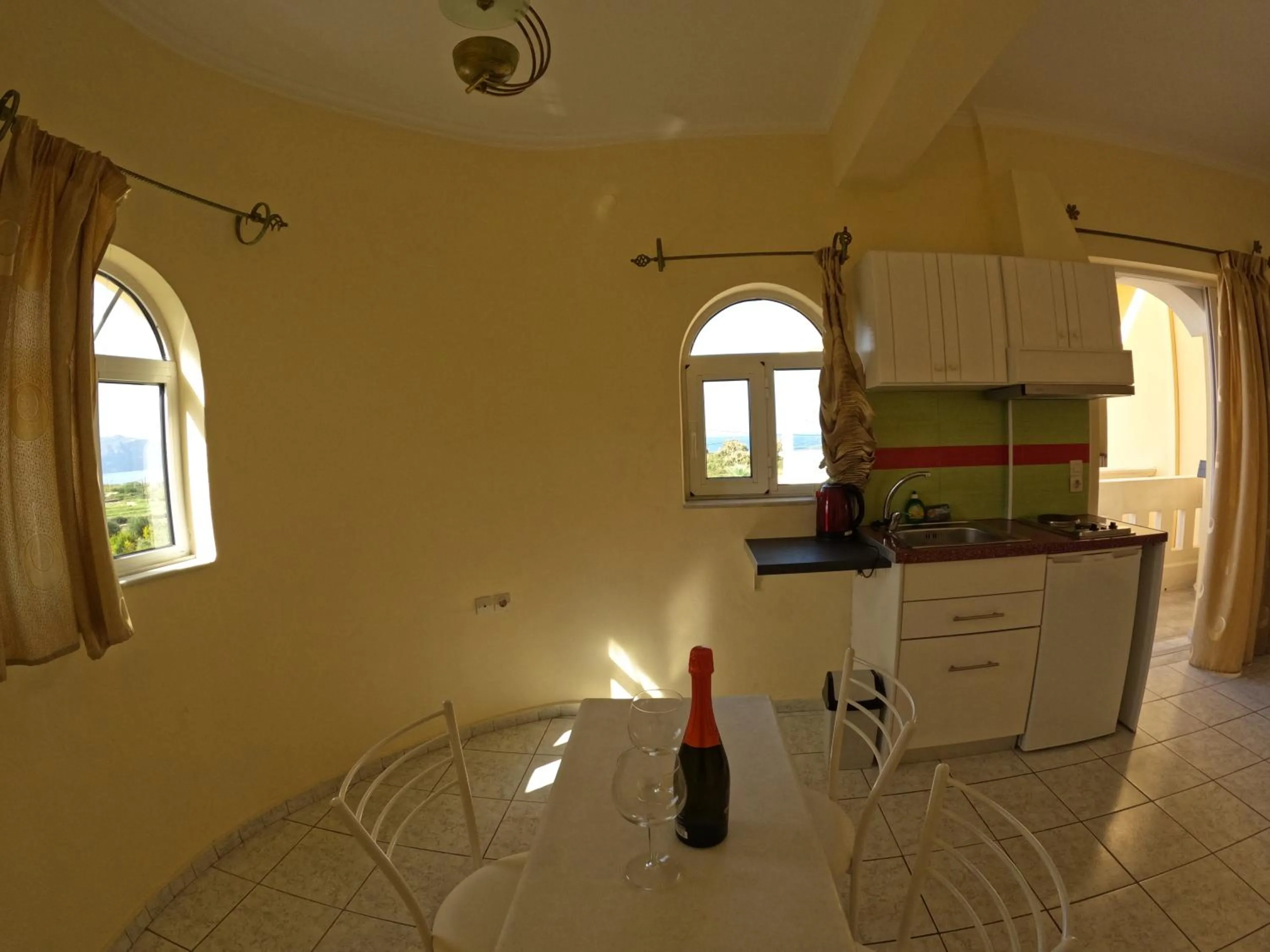 Kitchen or kitchenette in Palladion Hotel