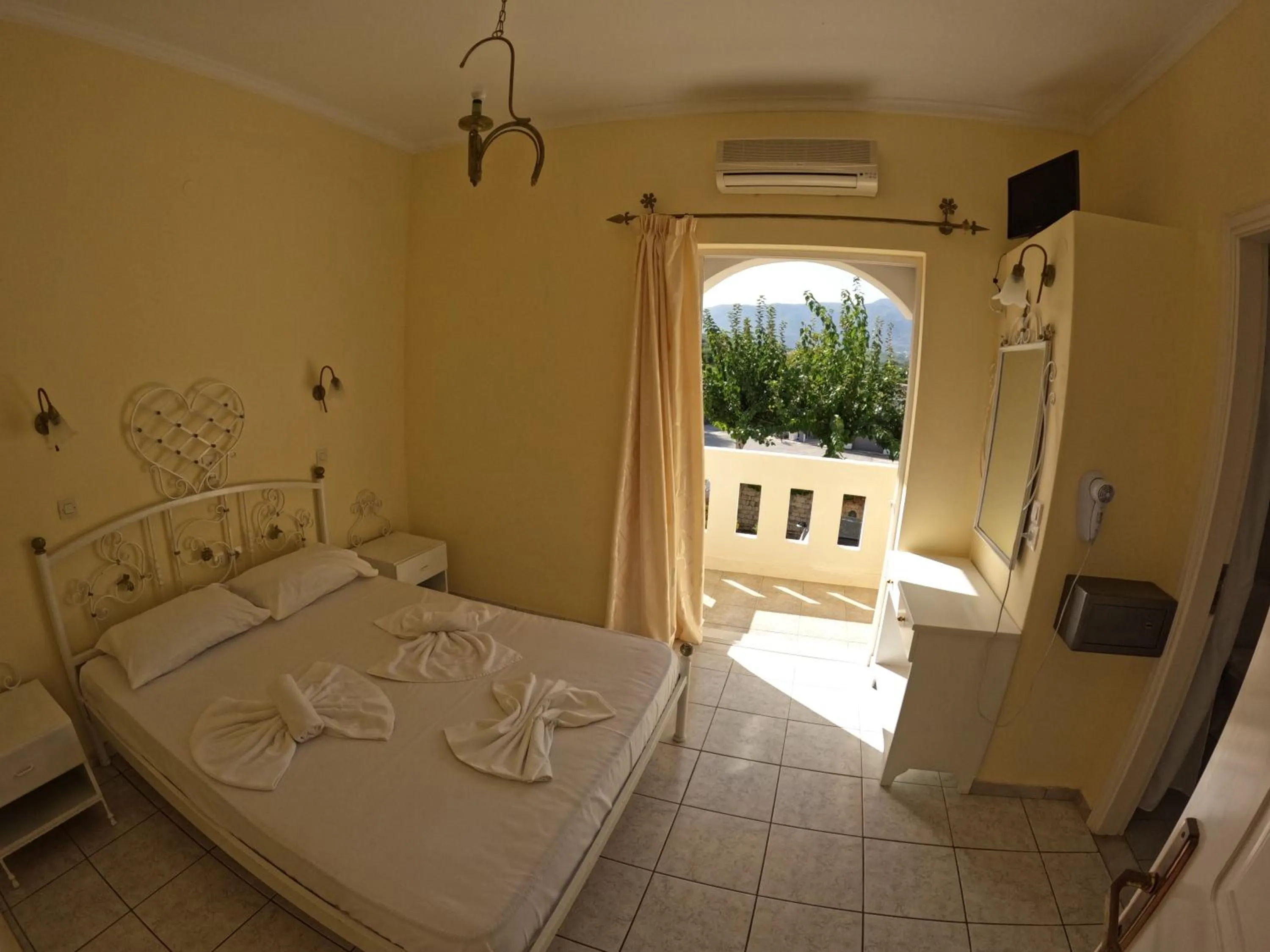 Bed in Palladion Hotel