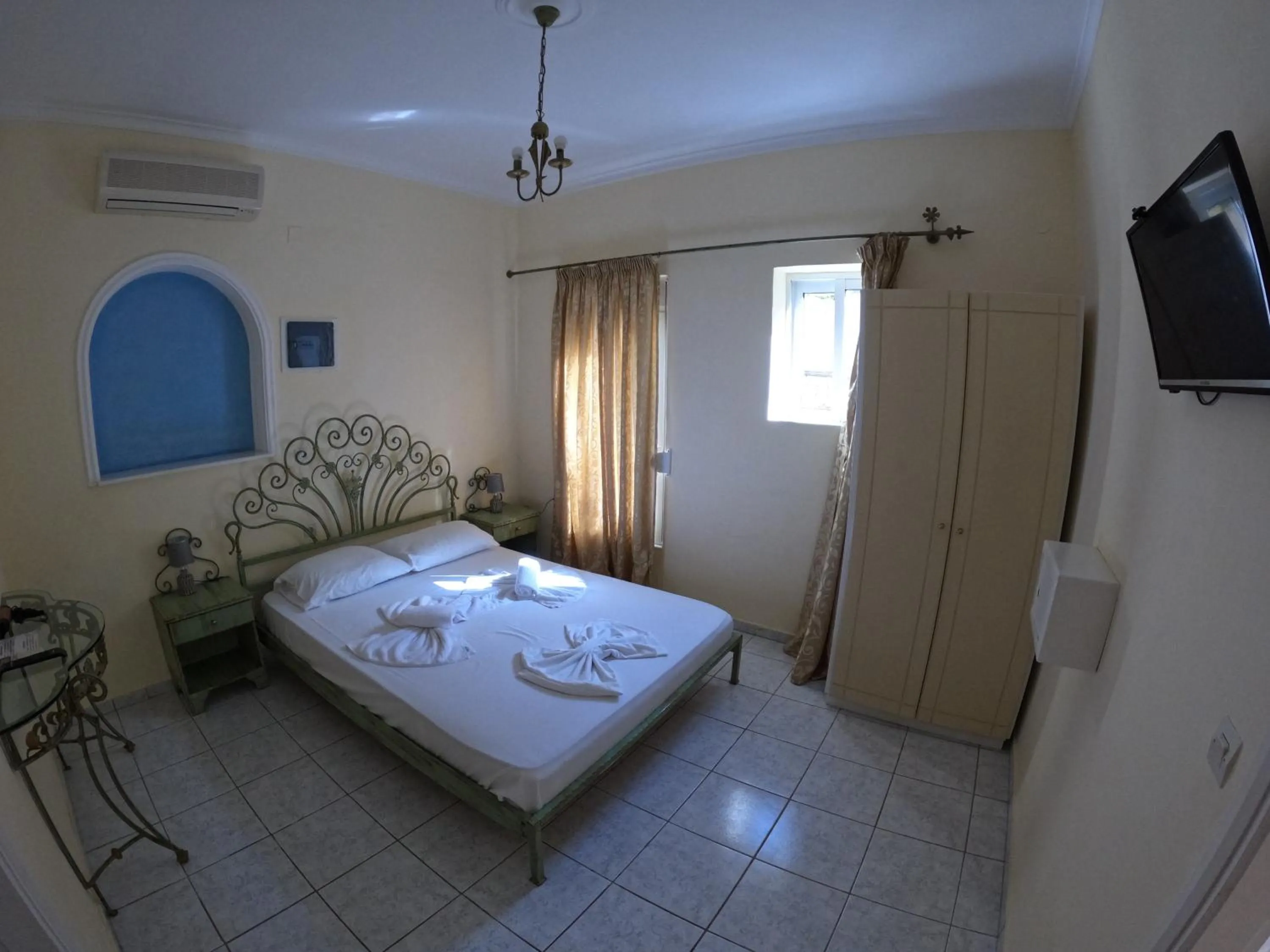 Bed in Palladion Hotel