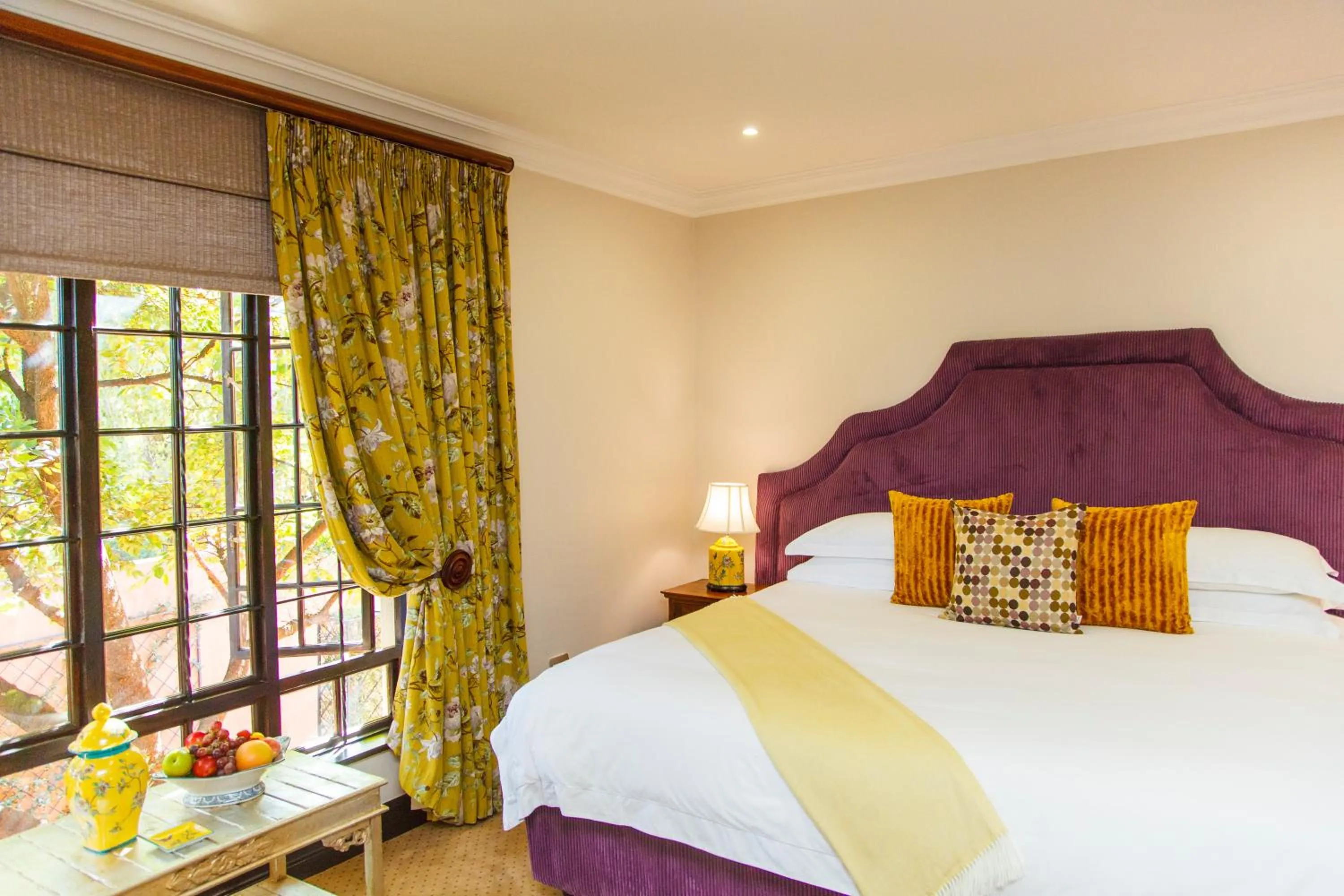 Bed in Ivory Manor Boutique Hotel