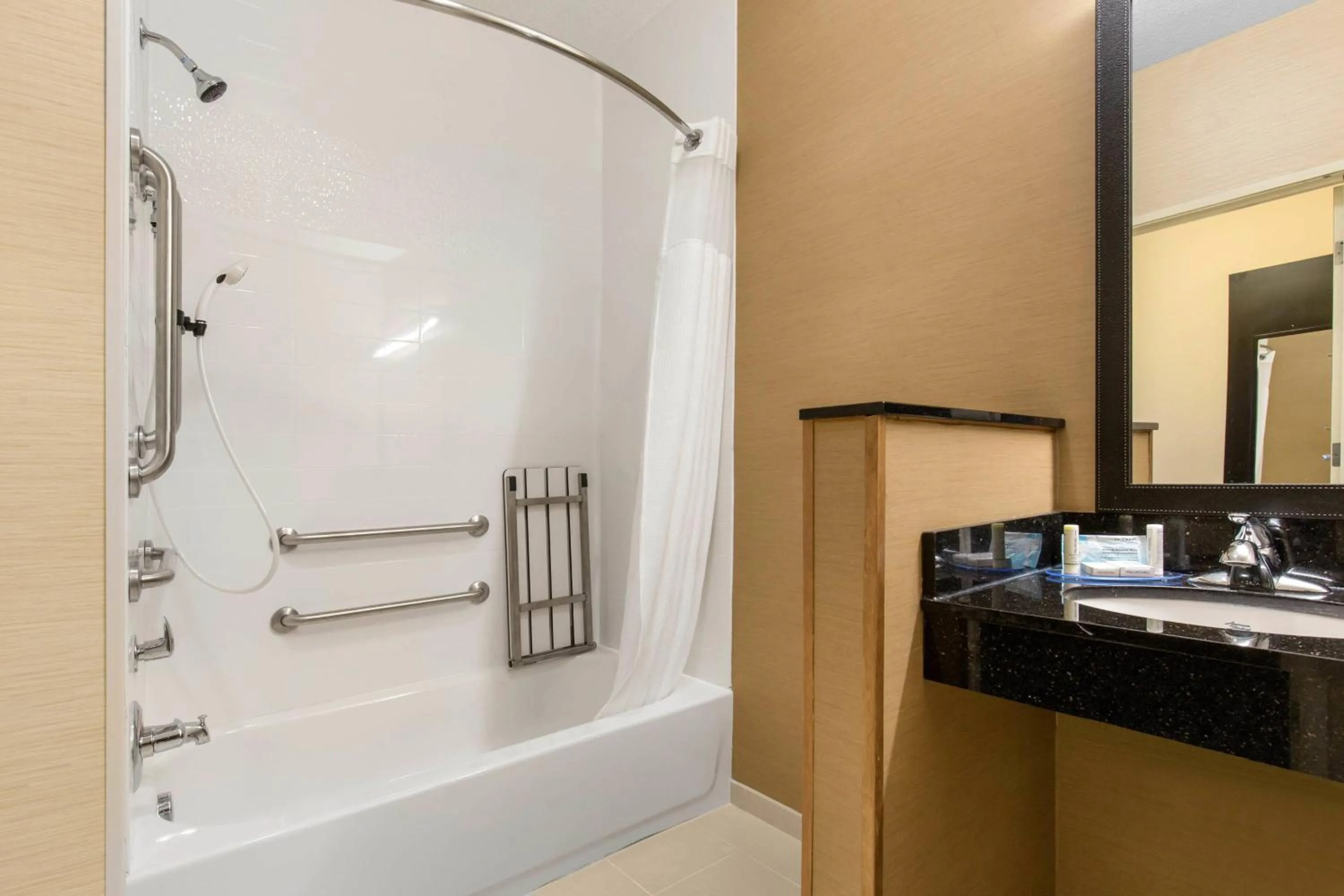 Bathroom in AmericInn by Wyndham St Cloud MN Shopping Area