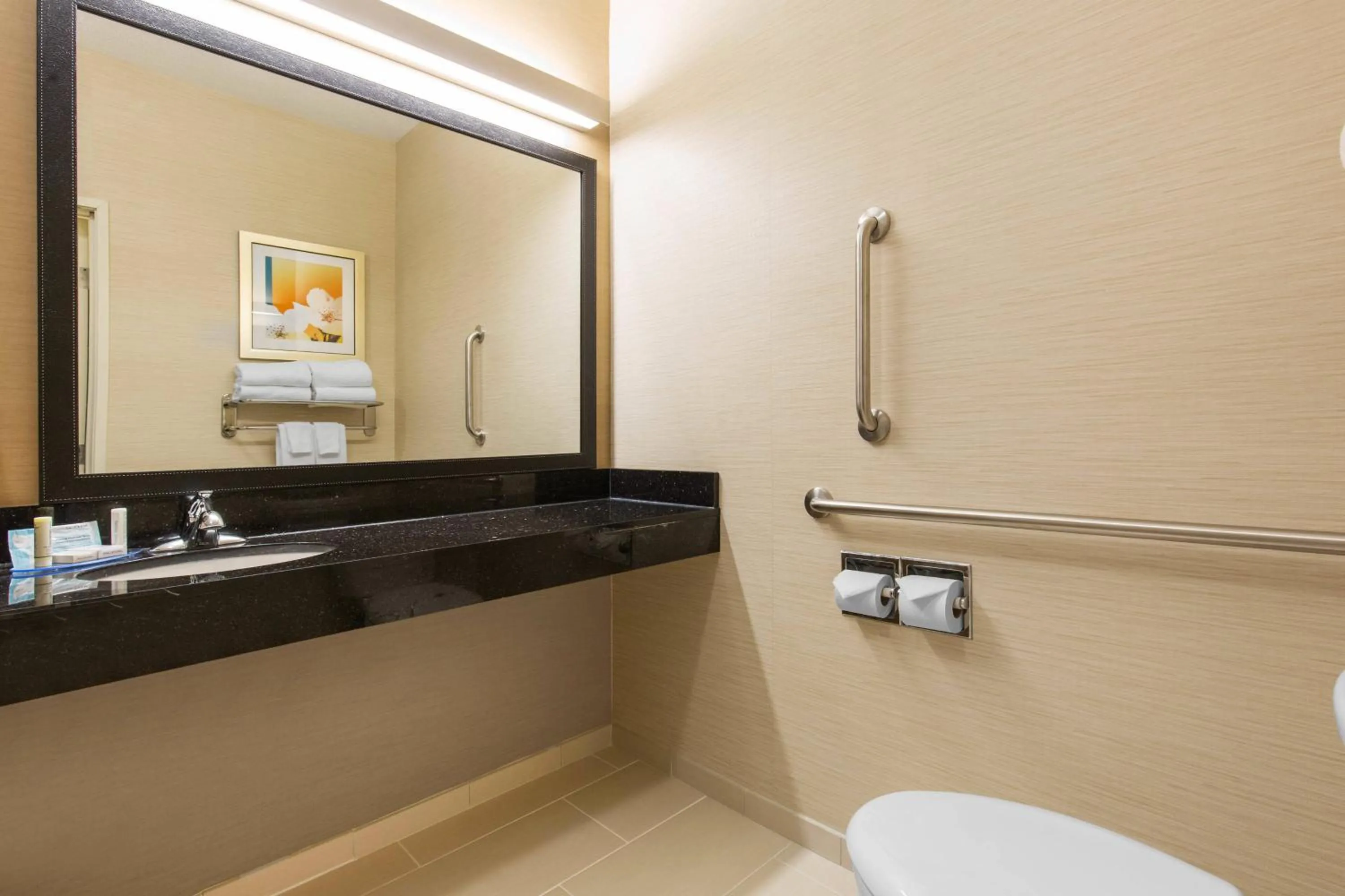 Bathroom in AmericInn by Wyndham St Cloud MN Shopping Area