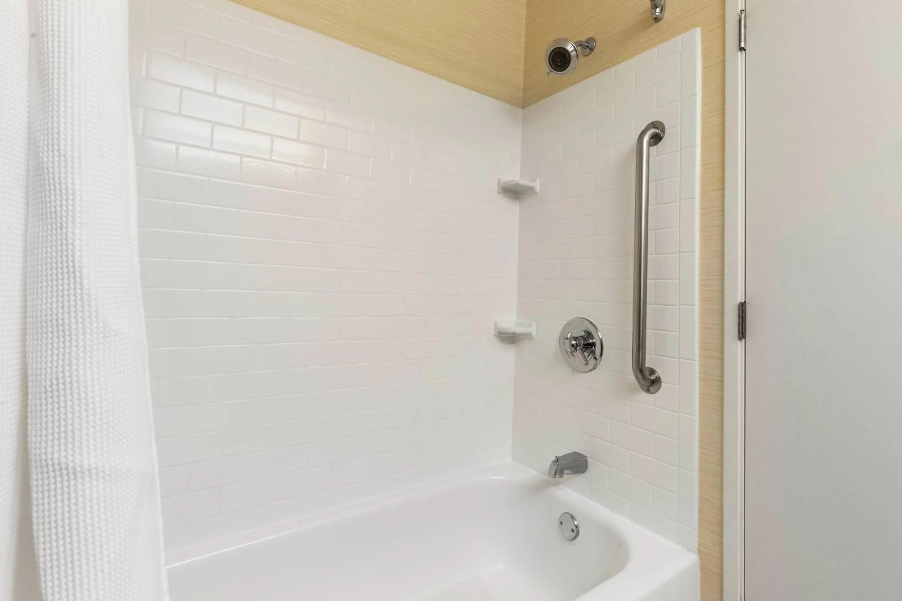 Bathroom in AmericInn by Wyndham St Cloud MN Shopping Area