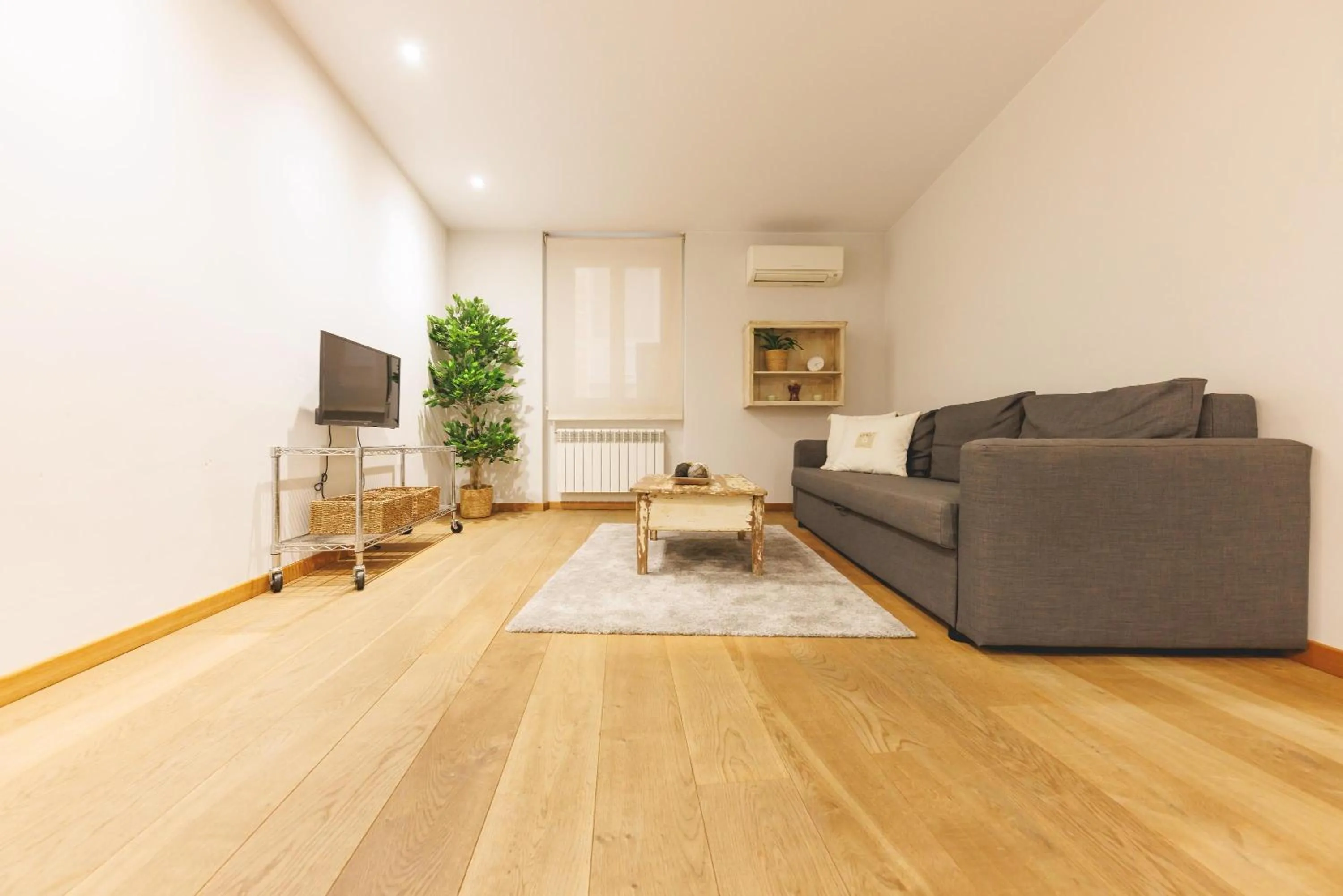 Living room in Bravissimo Força 17, Barri Vell apartments