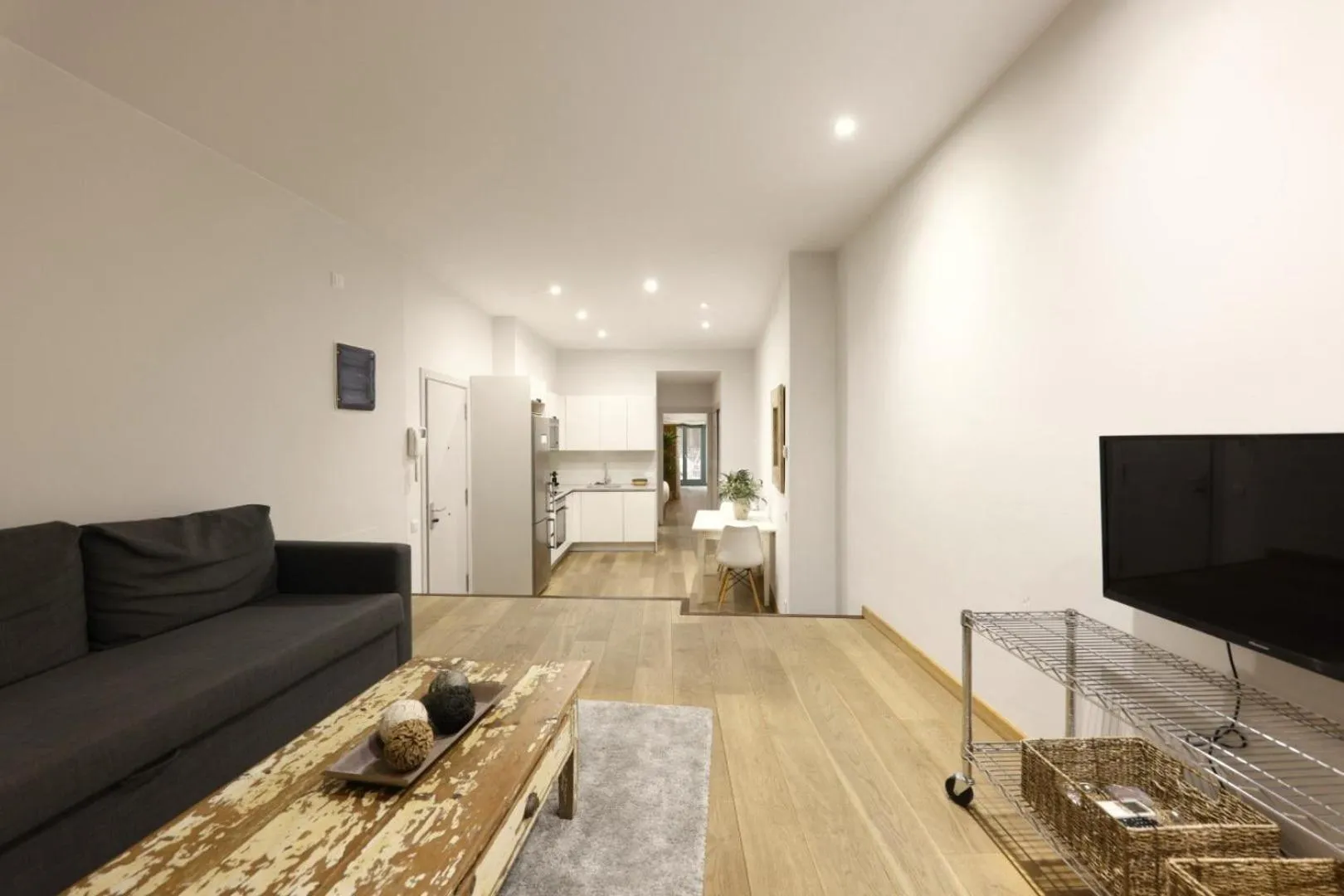 Seating area in Bravissimo Força 17, Barri Vell apartments