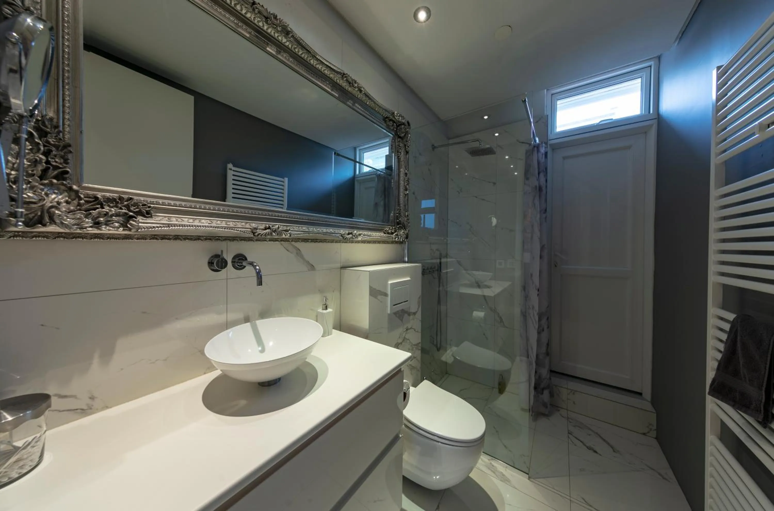 Bathroom in ICELAND SJF Villa, Hot tub & Outdoor Sauna Amazing Mountains and City View Over Reykjavík