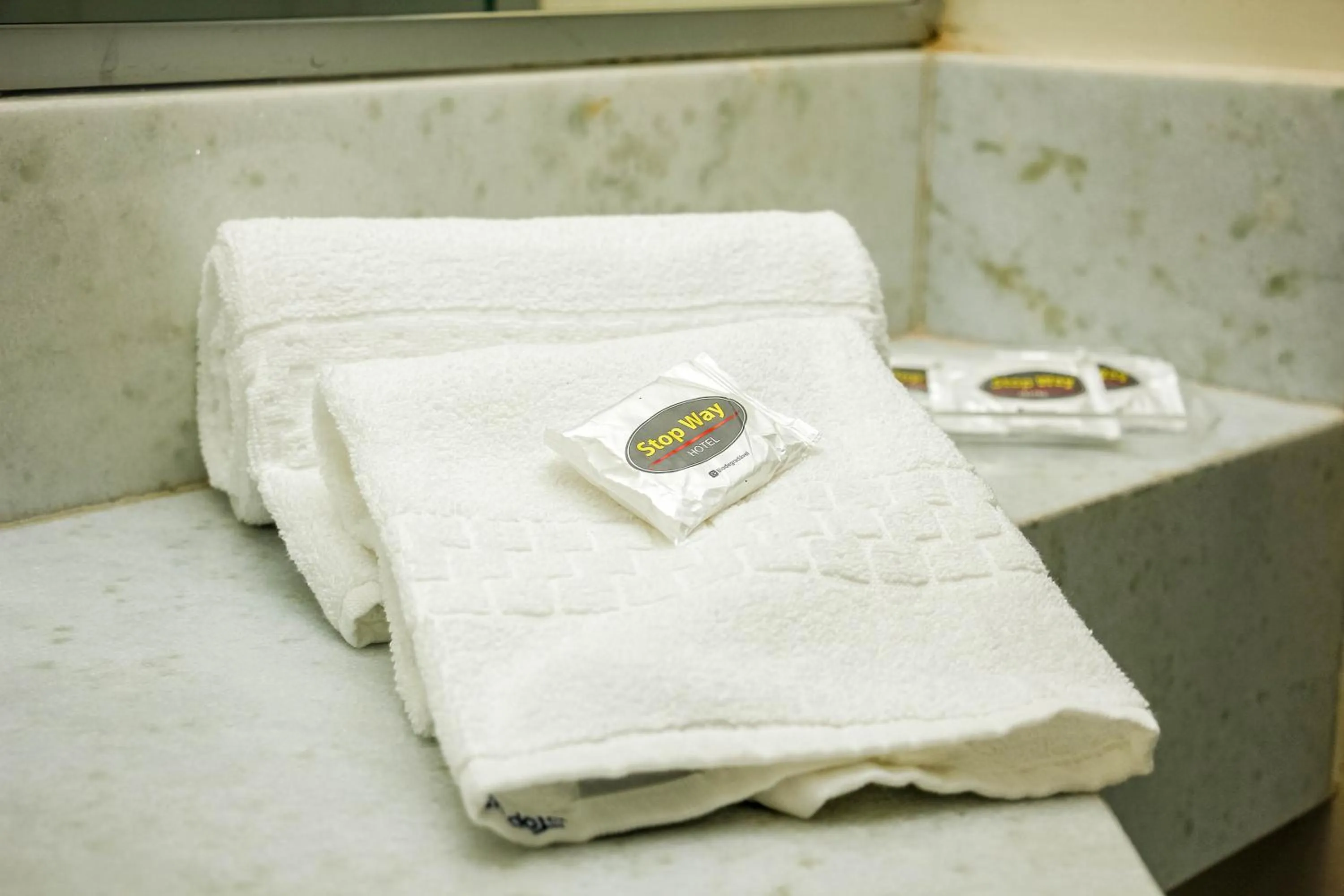 towels, Bed in Stop Way Hotel São Luís