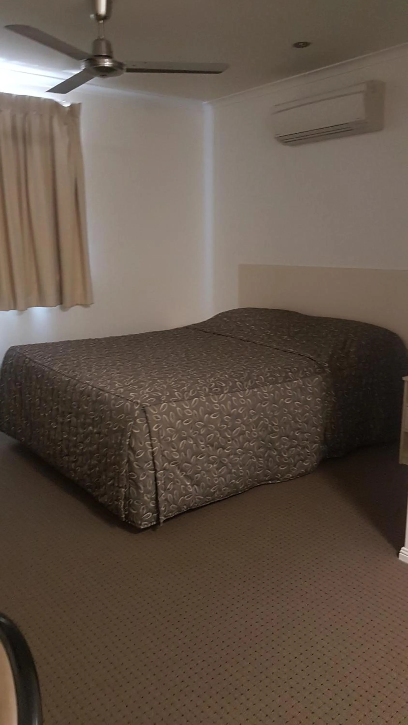 Bed in Sarina Hotel